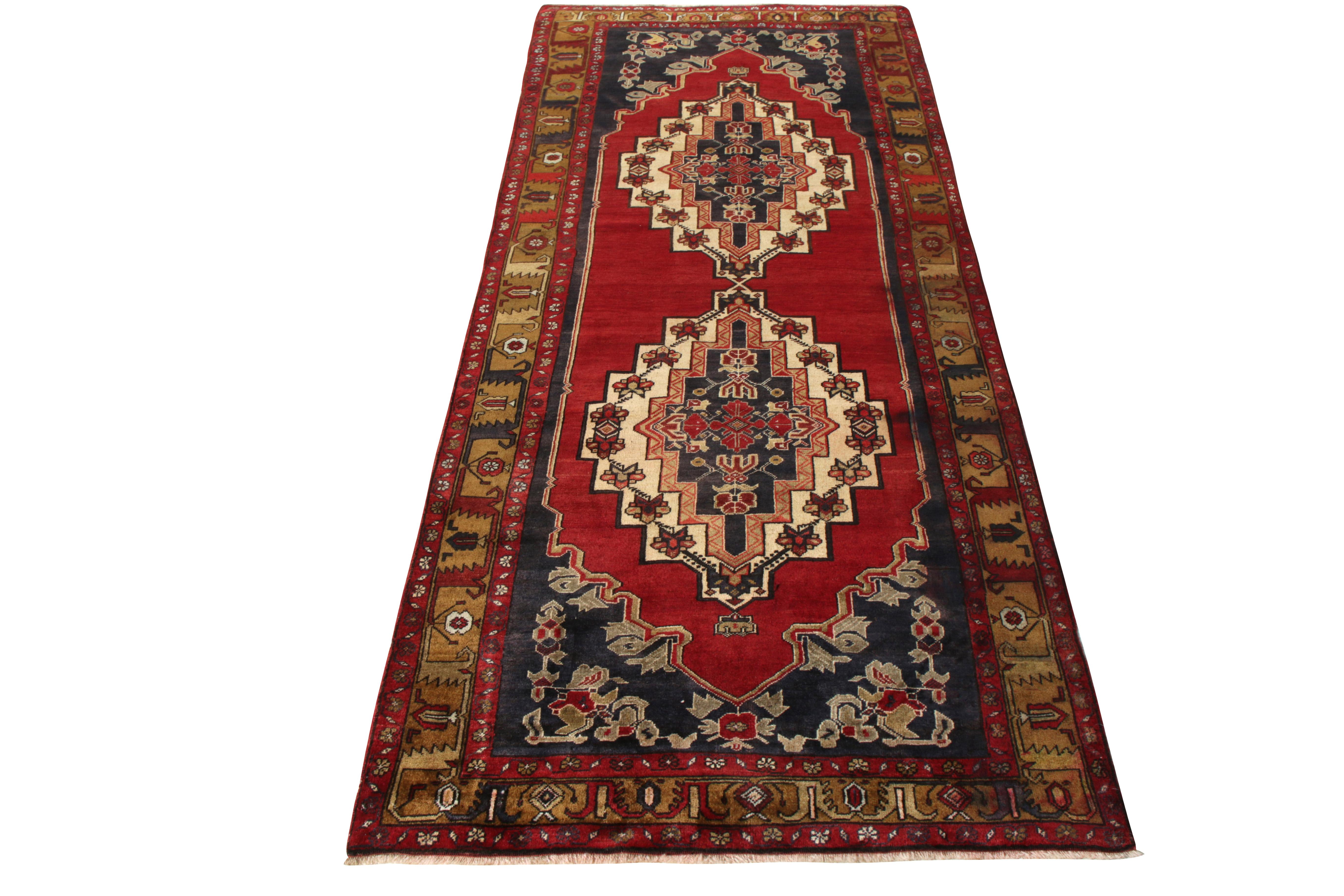Hand knotted in wool originating from Turkey circa 1950-1960, a vintage 5x12 Konya rug joining Rug & Kilim’s coveted Antique & Vintage Collection. The rug emanates the tribal instincts this regional Turkish style is known for through an engaging
