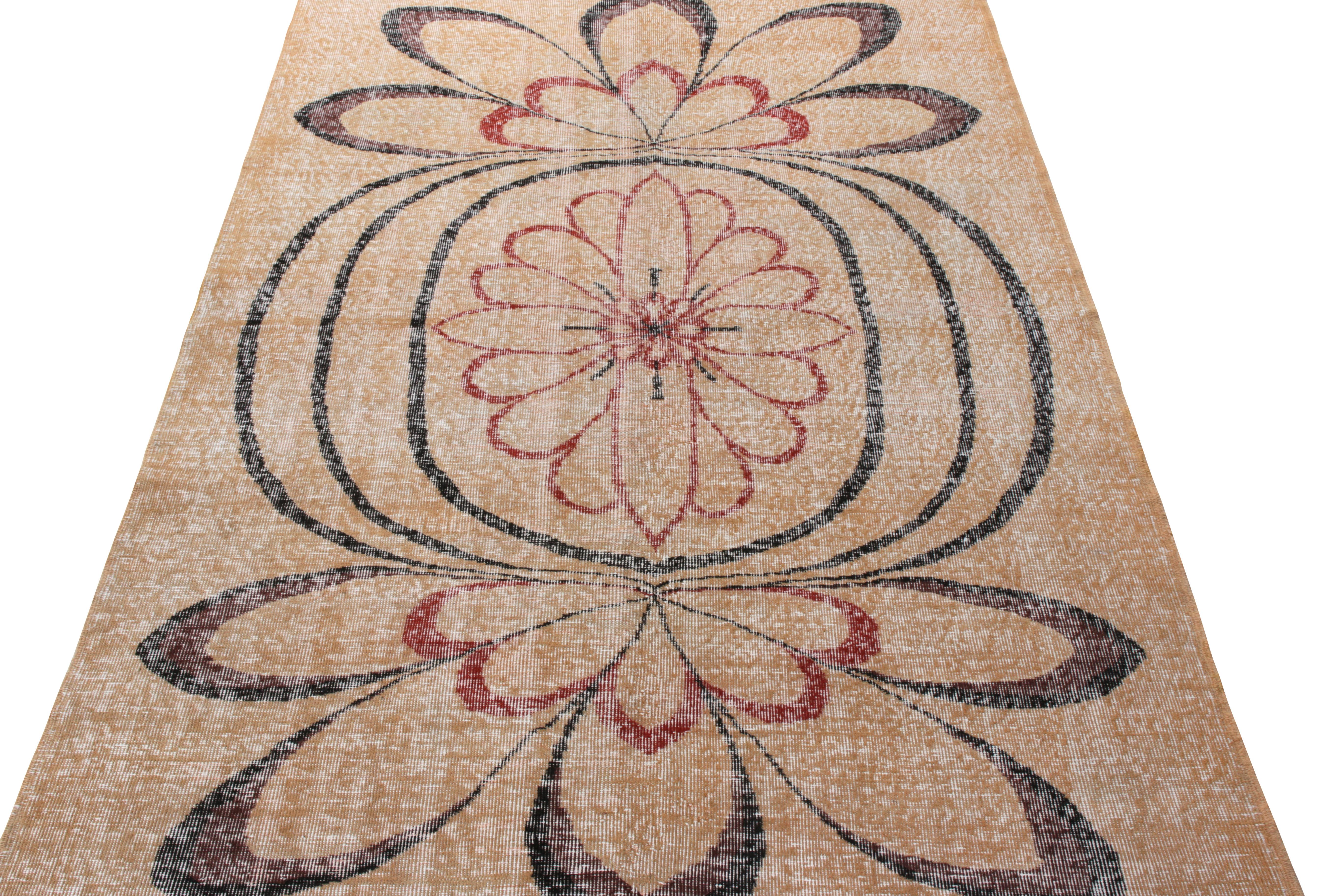 Hand-knotted in wool from Turkey originating between 1960-1970, this vintage mid-century 5x8 Deco rug belongs to Rug & Kilim’s expansive Mid-Century Pasha collection—celebrating the Turkish icon and multidisciplinary designer Zeki Müren with Josh’s