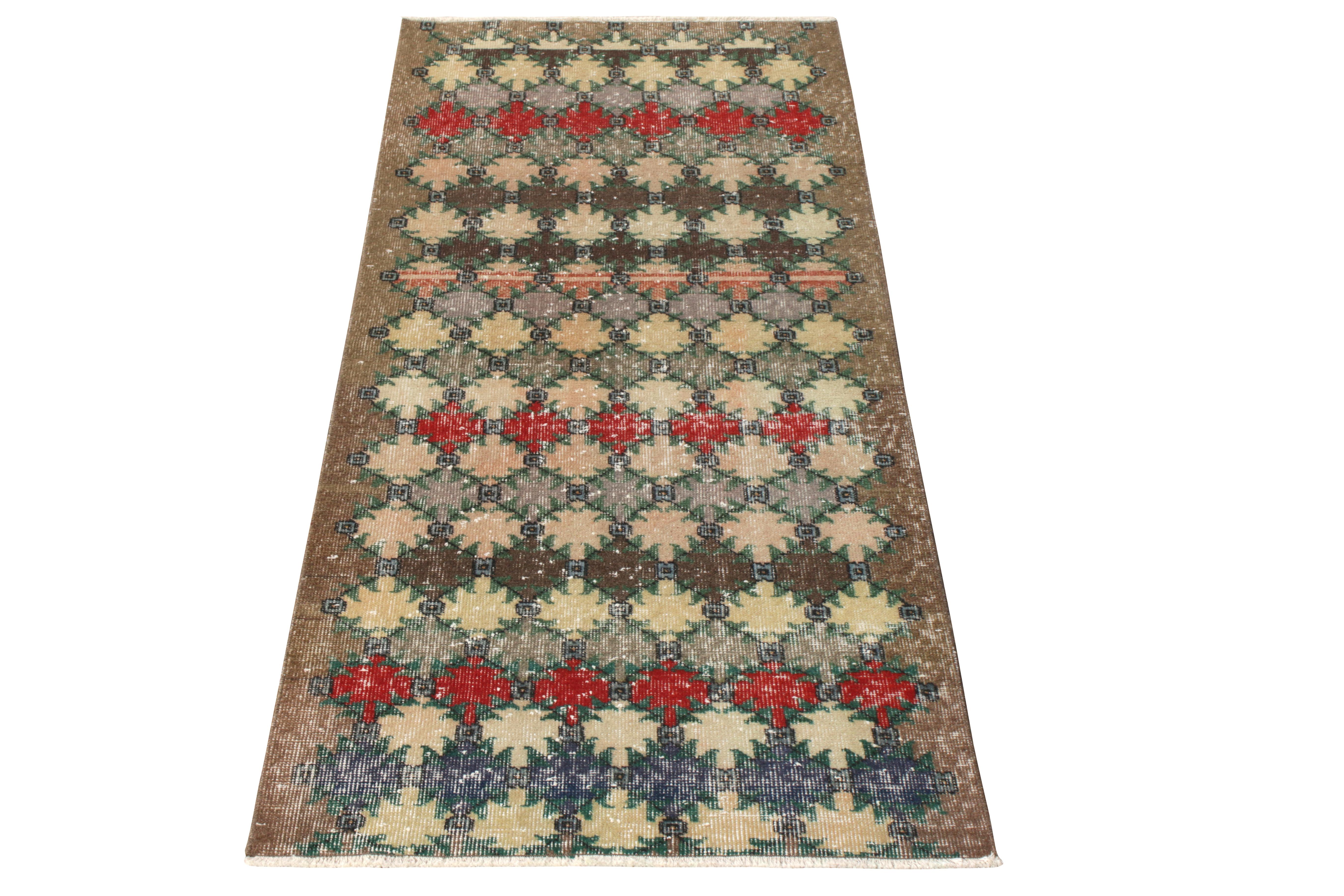 Hand-knotted in wool originating from Turkey circa 1960-1970, this vintage mid-century 3x6 runner belongs to Rug & Kilim’s expansive Mid-Century Pasha collection—celebrating the Turkish icon and multidisciplinary designer Zeki Müren’s works from