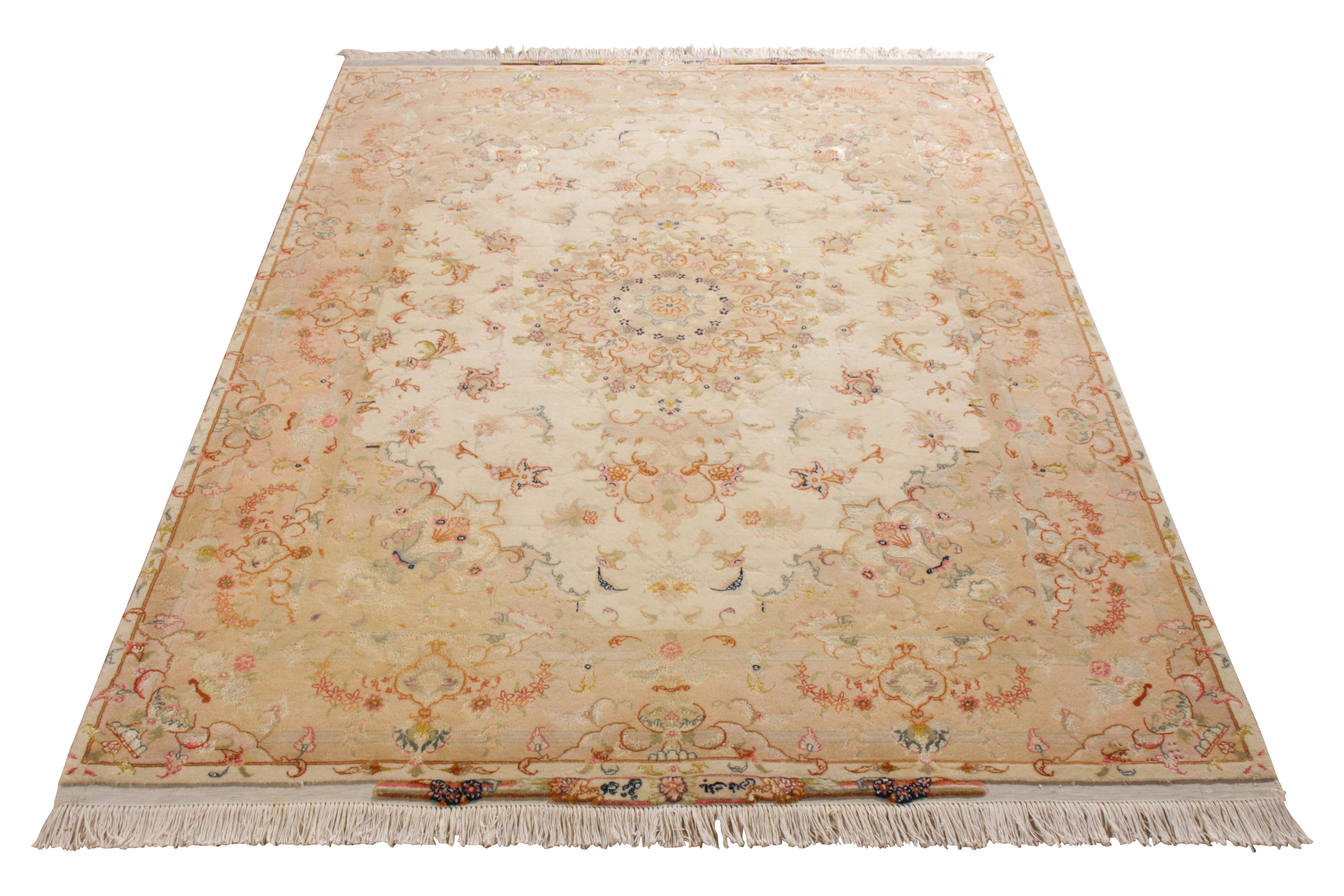 An exquisite 5 x 7 mid-century Persian rug making way to Rug & Kilim’s Antique & Vintage collection. The piece boasts an eye-catching medallion pattern that rests in a comforting Peach and White colourway that harbours an elegant personality. The