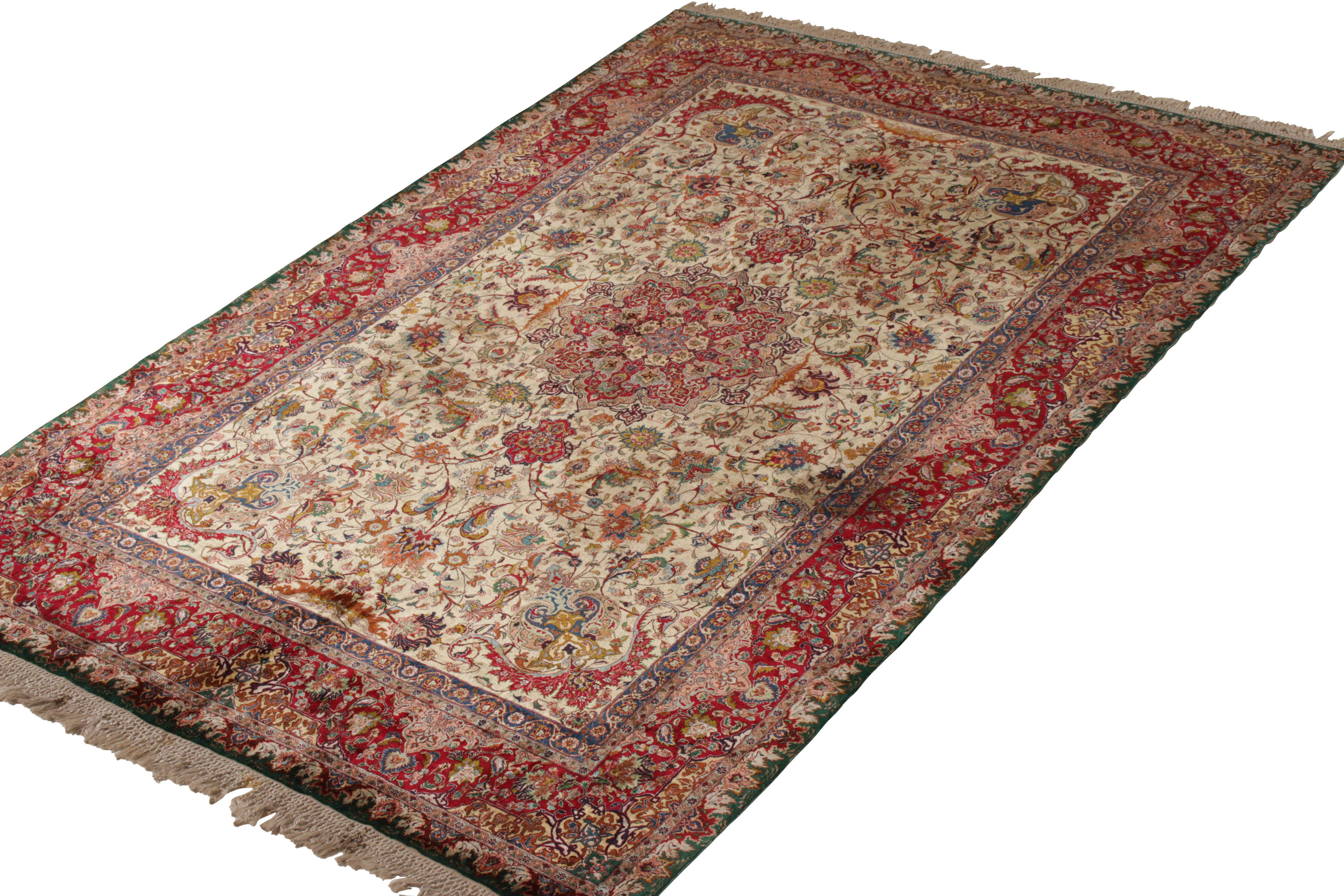 A 7x10 vintage Persian rug of Tabriz origin, hand knotted in finely woven silk warps circa 1950-1960. A regal choice exemplifying the finest, most rare vintage Tabriz rug styles Josh has seen in our extensive classic collection. 

Further on the