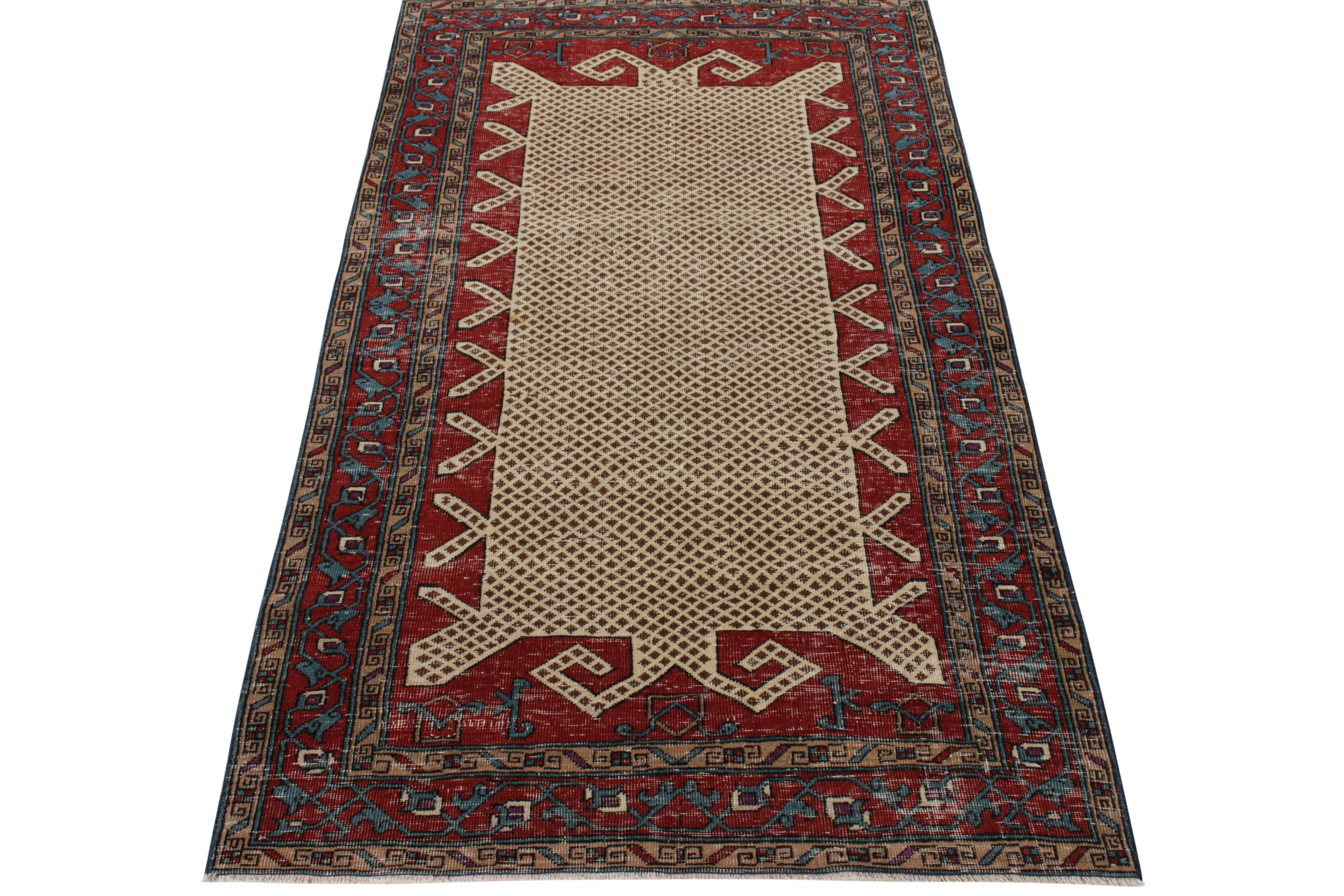 Originating from Turkey circa 1960-1970, an 4x8 vintage mid-century rug featuring a gorgeous geometric pattern in deep tones of maroon and bottle blue juxtaposed by beige-brown; impeccably complementing Anatolian Turkish motifs on the scale. From