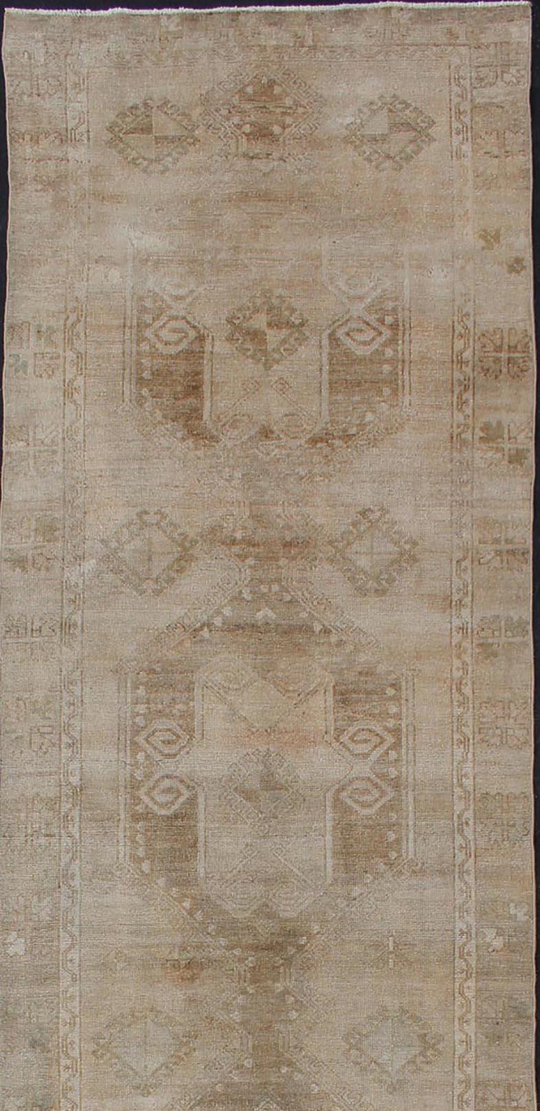 Oushak Hand Knotted Vintage Turkish Runner in Earth Tones & Light Brown in Medallions For Sale