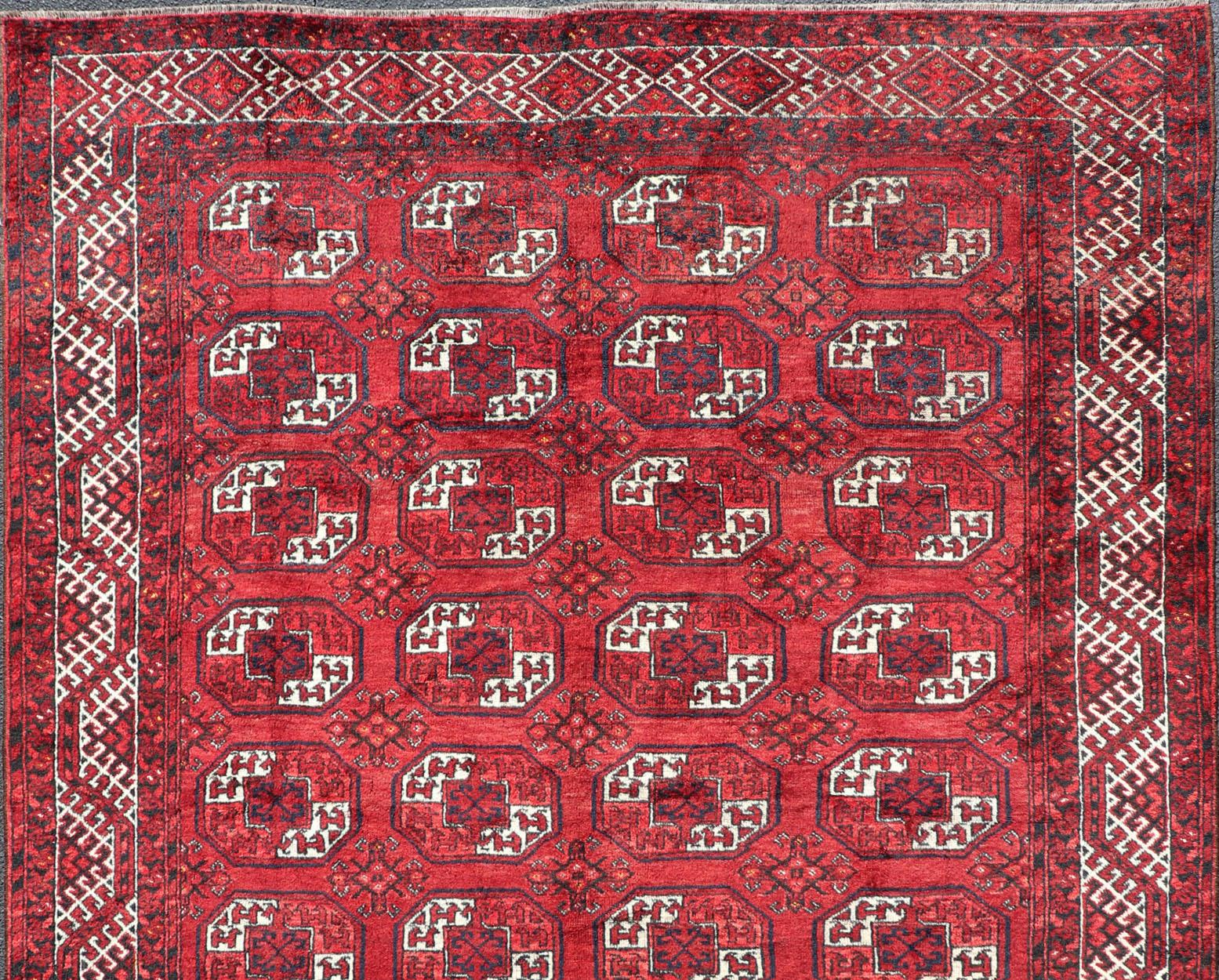 Uzbek Hand-Knotted Vintage Turkomen Ersari Rug in Wool with Repeating Gul Design For Sale