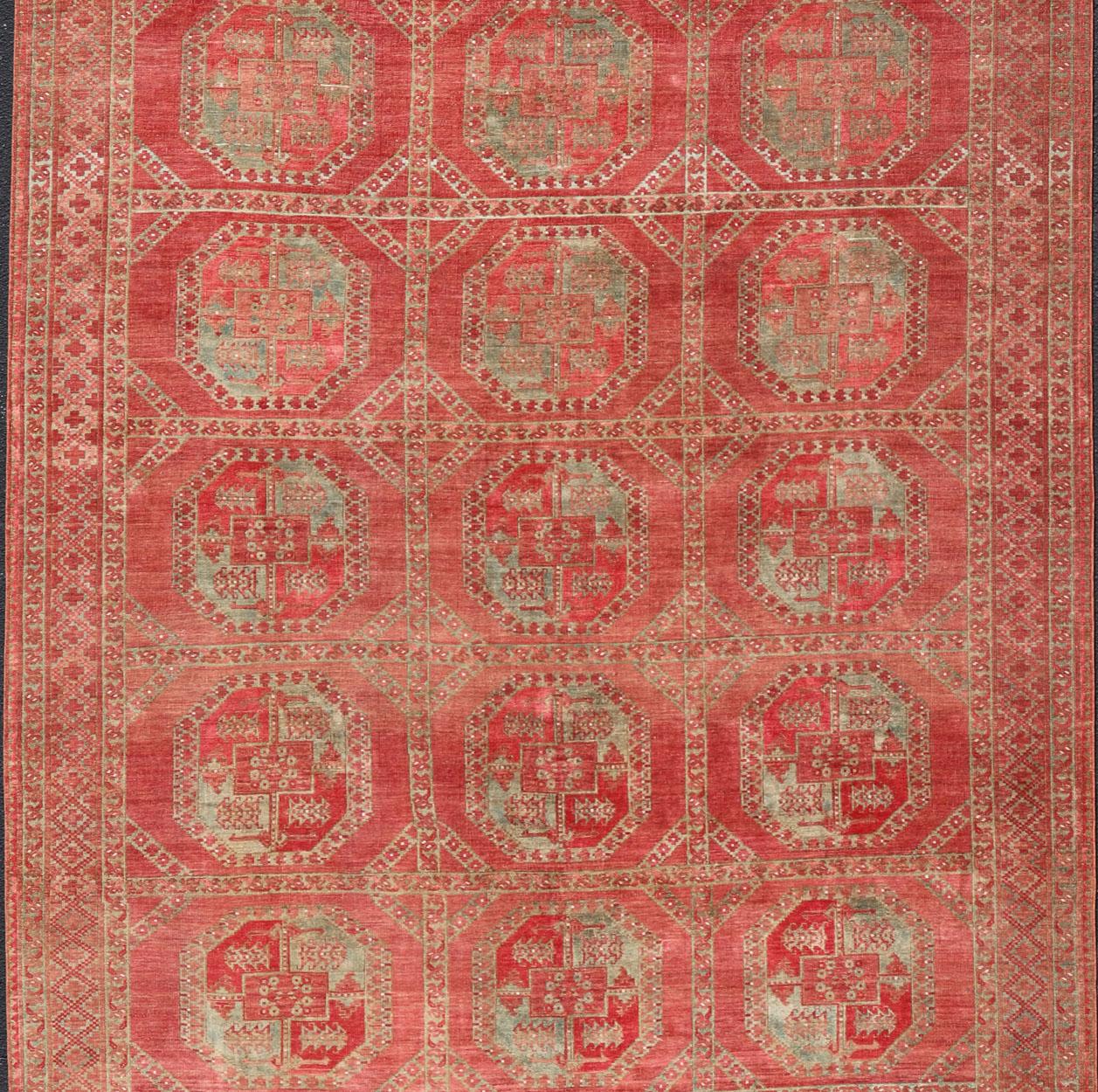 20th Century Hand-Knotted Wool Ersari Rug in Wool with Gul Design in Shades of Red & Green