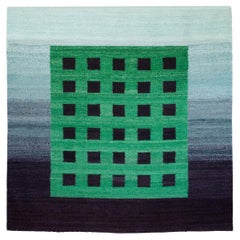 Hand-woven wool rug "Green on gray" by Roberto Aizenberg