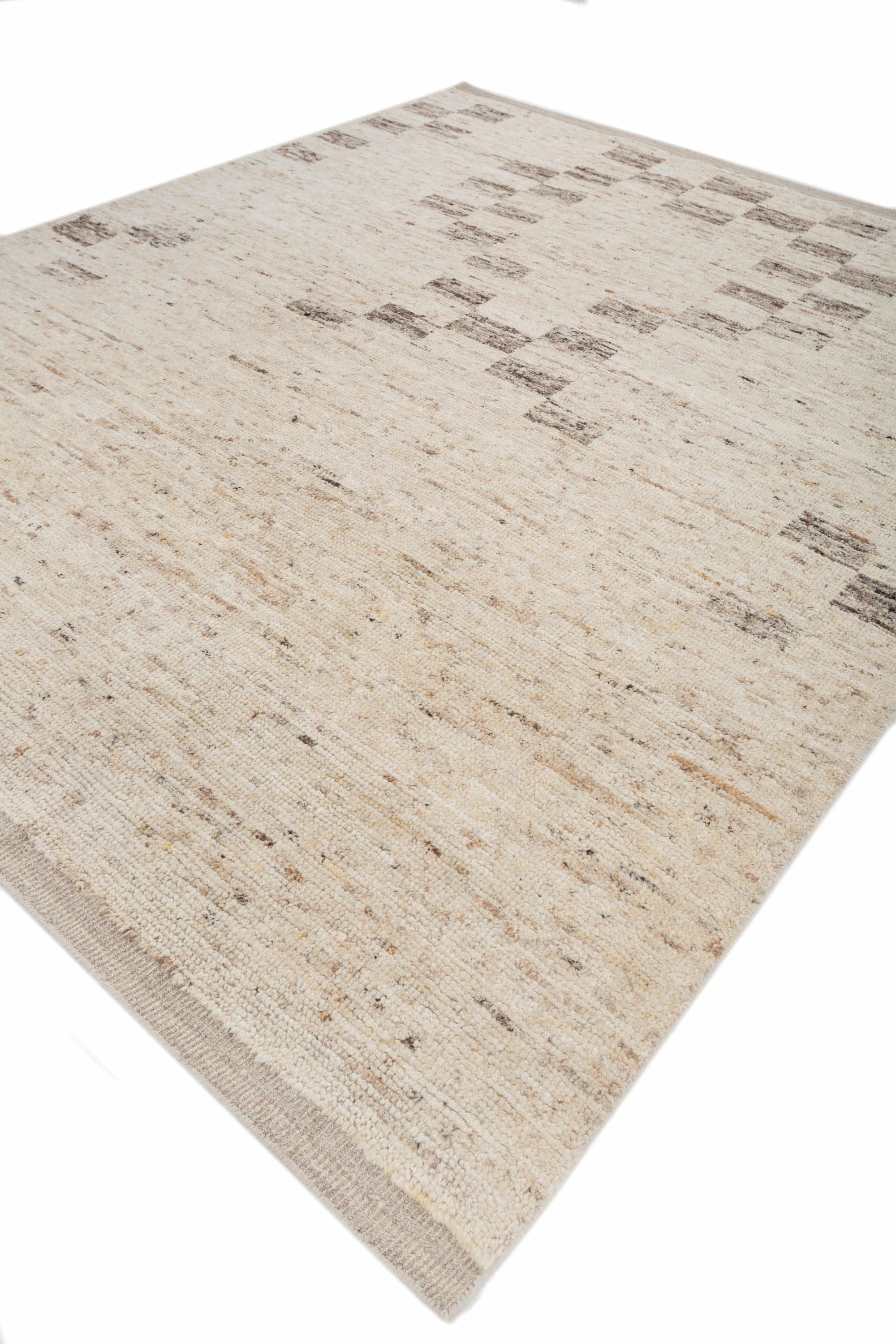 Dieser 9' x 12' große Jaipur-Teppich in ruhigen, natürlichen Elfenbein- und Nerztönen verbindet minimalistische Schönheit mit organischer Textur. Der von Kunsthandwerkern aus hochwertiger Wolle handgeknüpfte Teppich hat ein dezentes, erdiges Muster,