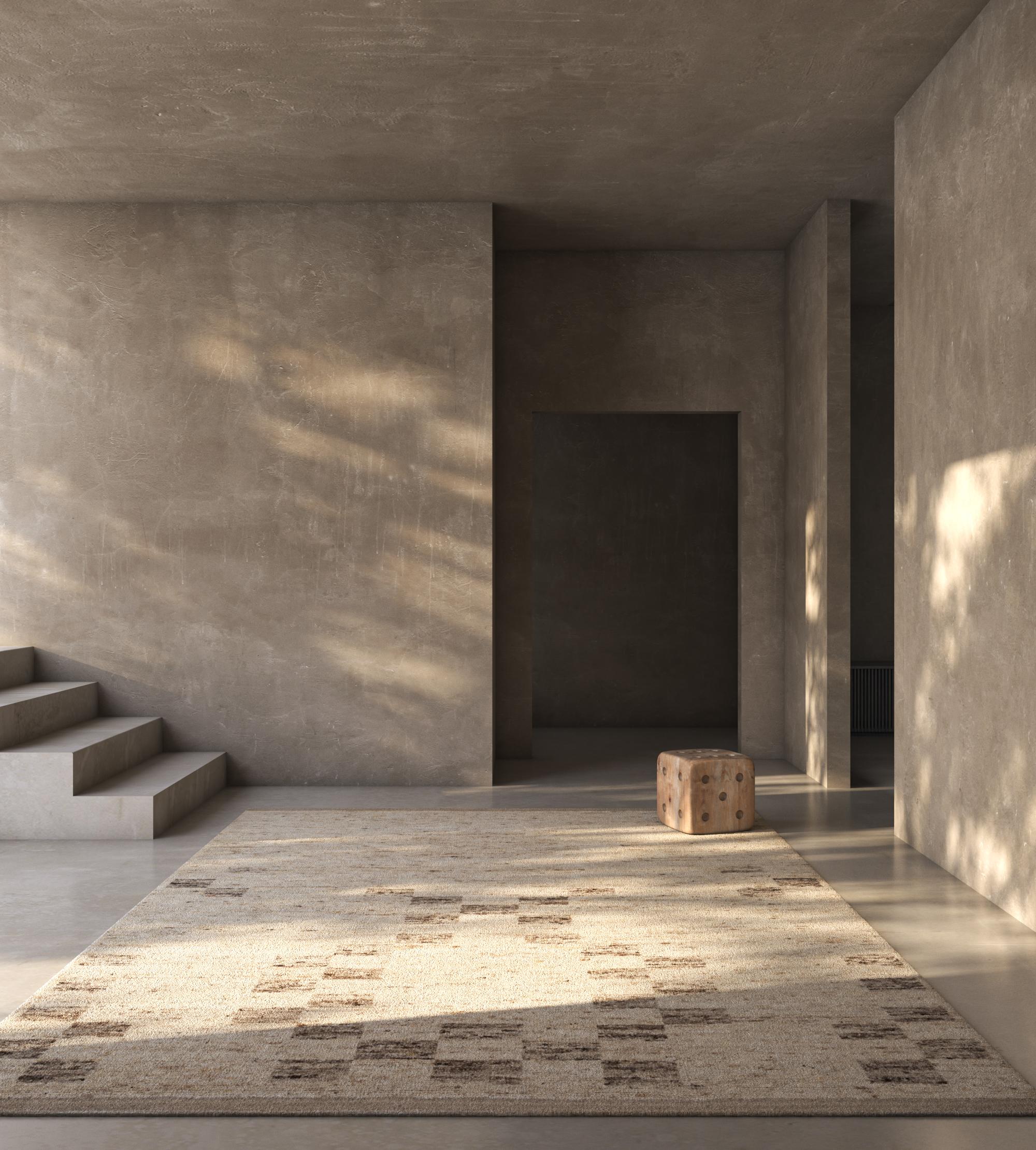 Dieser 9' x 12' große Jaipur-Teppich in ruhigen, natürlichen Elfenbein- und Nerztönen verbindet minimalistische Schönheit mit organischer Textur. Der von Kunsthandwerkern aus hochwertiger Wolle handgeknüpfte Teppich hat ein dezentes, erdiges Muster,