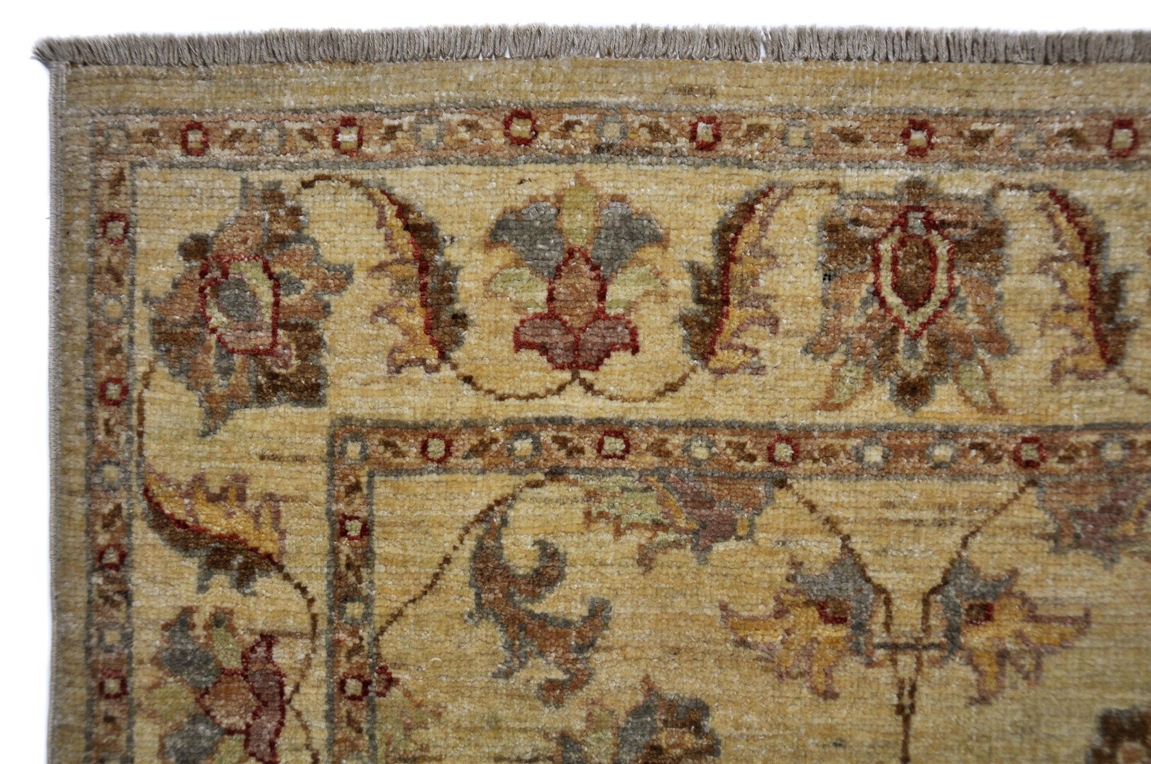 The Farahan runner is hand knotted with woolen yarns, the chain and weft is made of pure cotton. The soft tones and the 