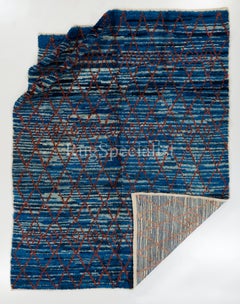 Hand-Knotted Wool Rug – Striated Blue Ground with Red Geometric Lattice Pattern