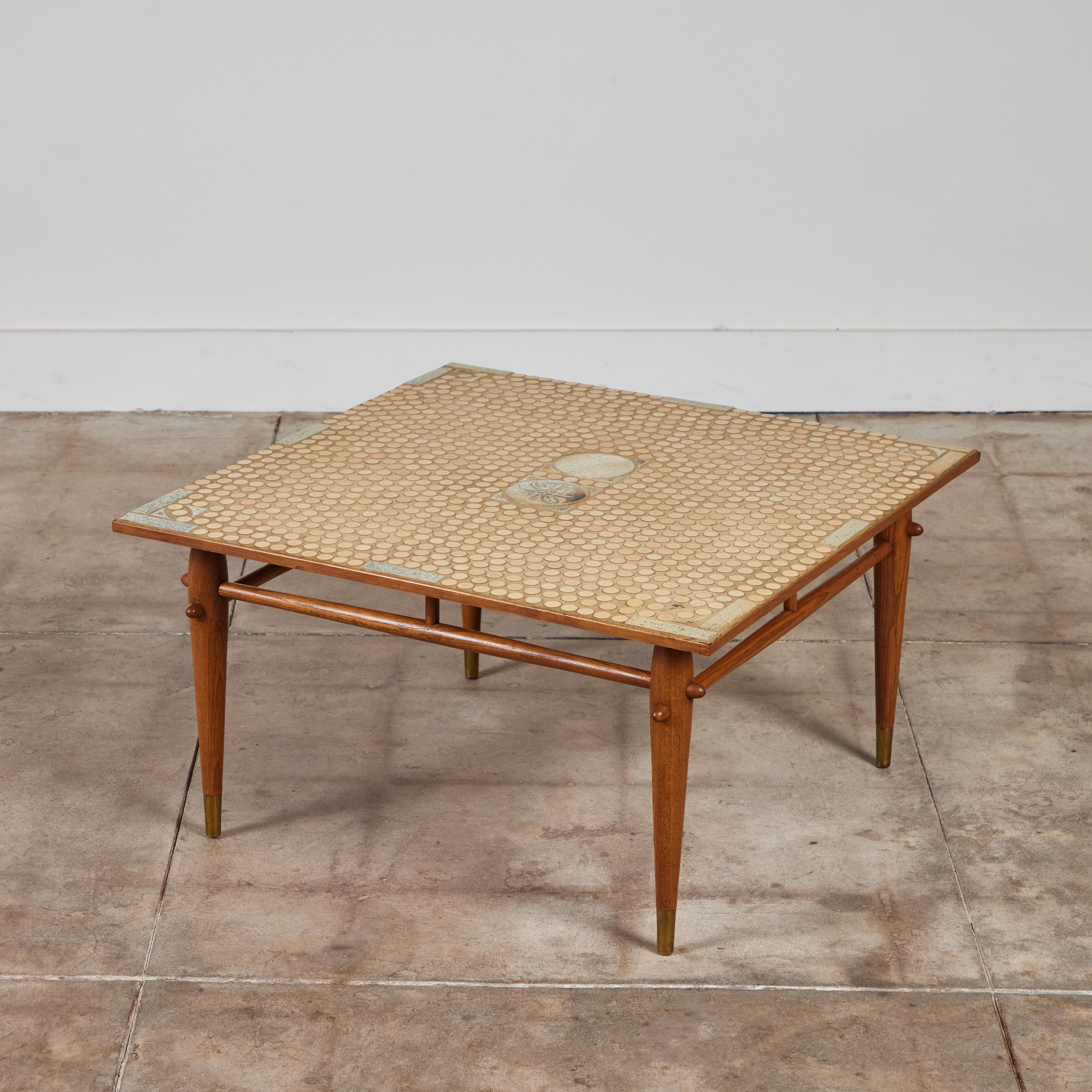 Tile topped coffee table in the style of Tue Poulsen and Gordon and Jane Martz. The table features muted tone round, triangular and rectangular tiles. The square oak frame has four dowel tapered legs connected by oak stretchers near the table