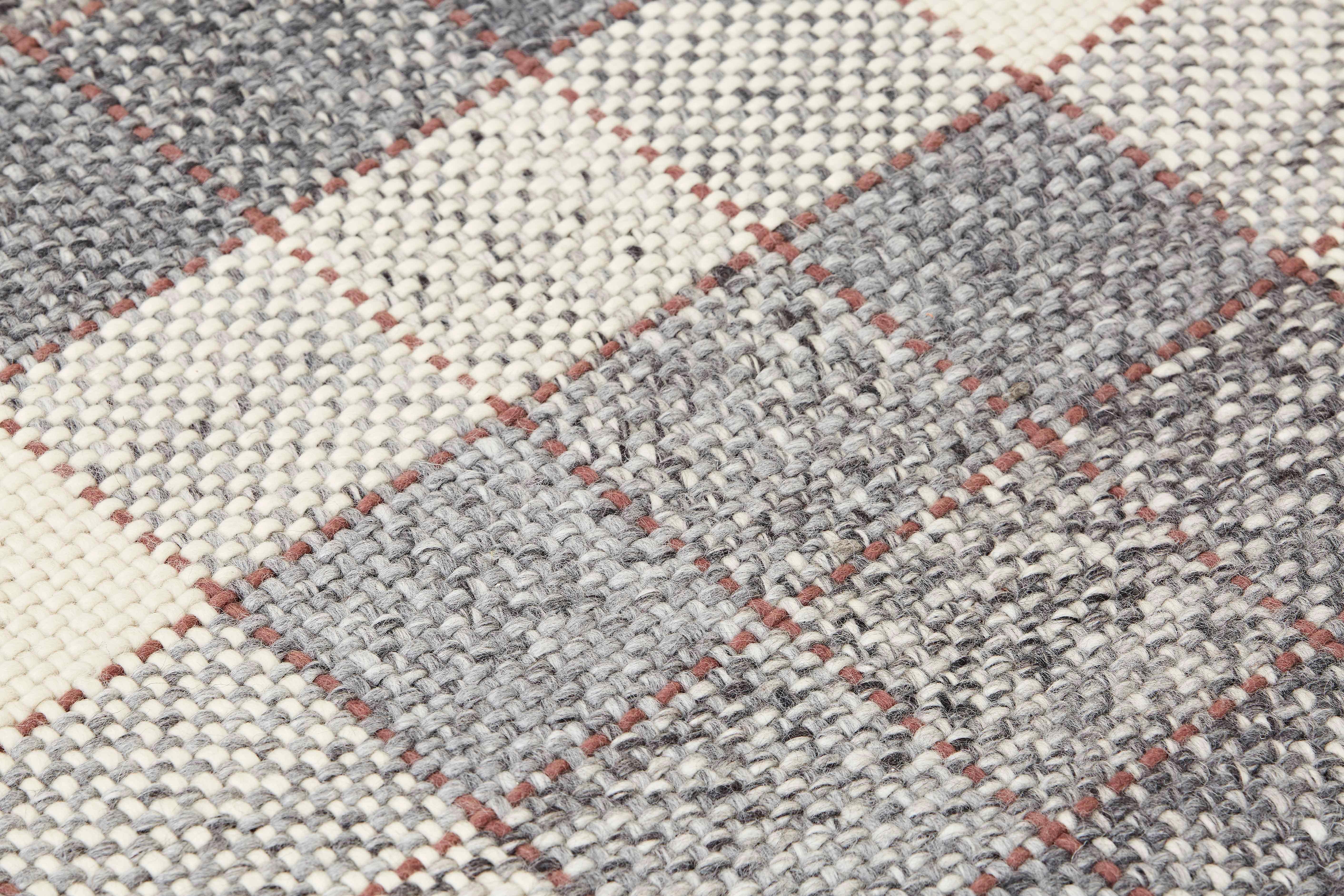 grey and rust rug