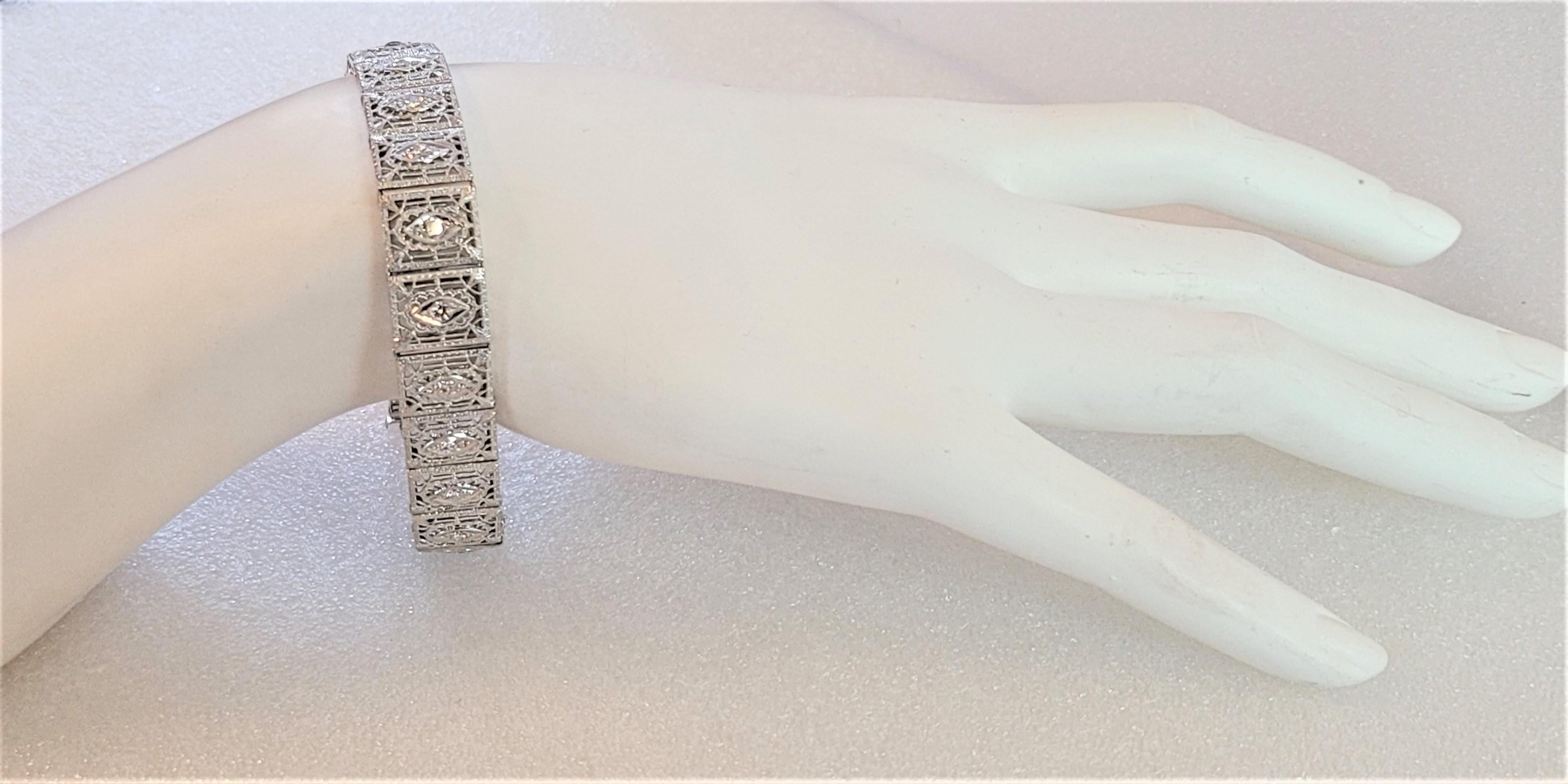 Hand-Made Bracelet with Diamonds 
Material 14K & Platinum 950
Gender Women 
Diamonds 1.96ctw 
Diamond Clarity VS
Color Grade E
Bracelet Weight  17.6gr
Mint Condition Like New
Retail Price $ 5000