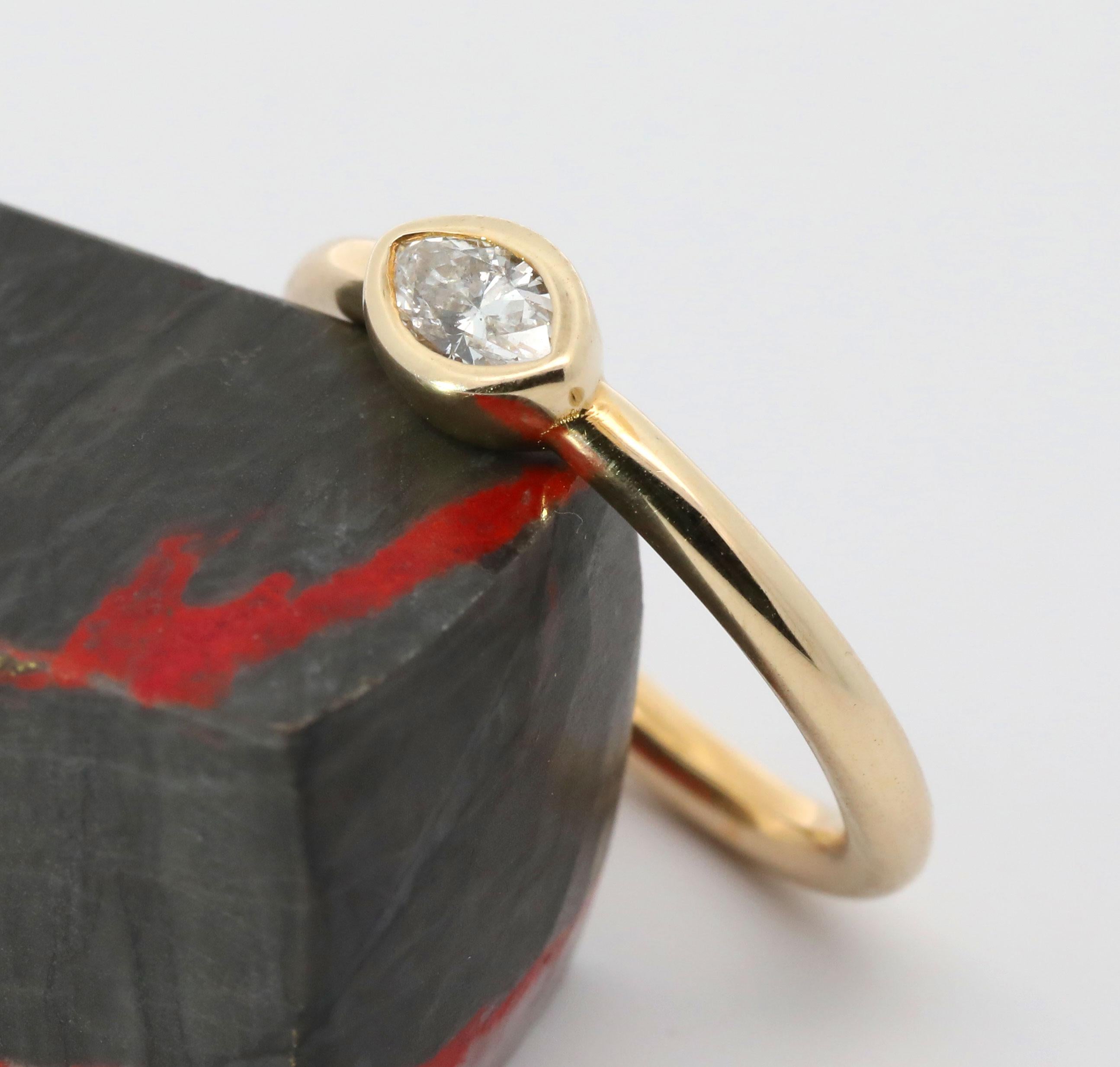 Hand Made 14K Yellow gold & Natural Marquise Cut Diamond Ring. 
Total Weight: 3.5grams. 
Diamond: 0.37cts. 
Ring Size: 6.5