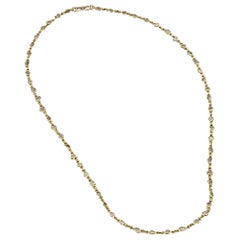 hand made 18K gold chain set with sliced diamonds