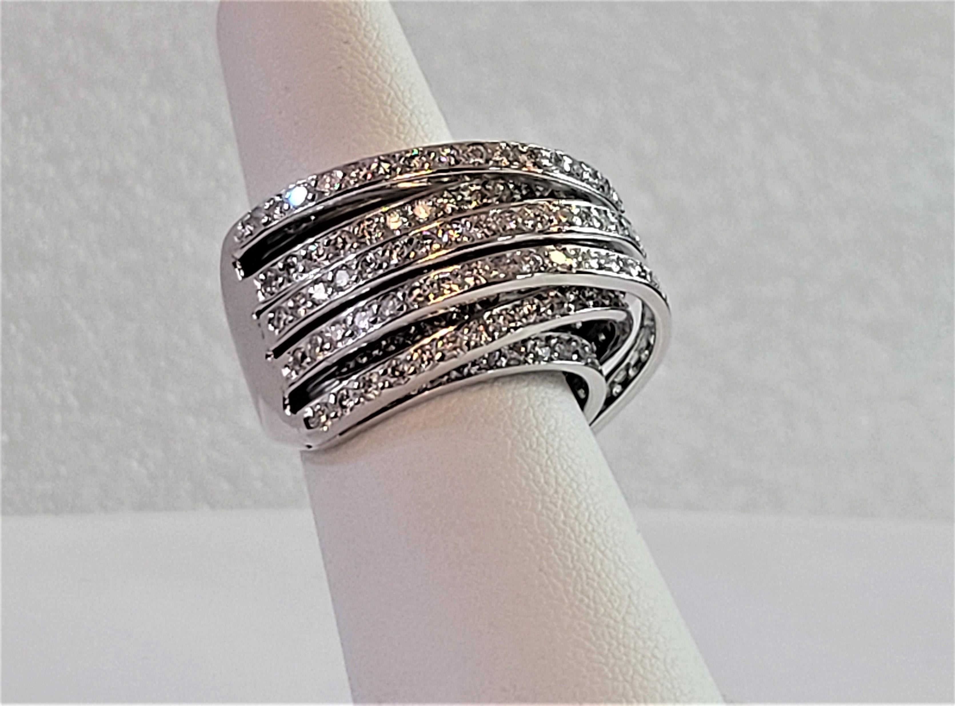Hand-Made Diamond Ring
Material 18K White Gold
Ring Size 7
Diamonds 4.90ctw 
Dia Clarity VVS
Color Grade F
Ring Weight 20.8gr
Gender Unisex  
Condition New, never worn
Retail Price$ 15000