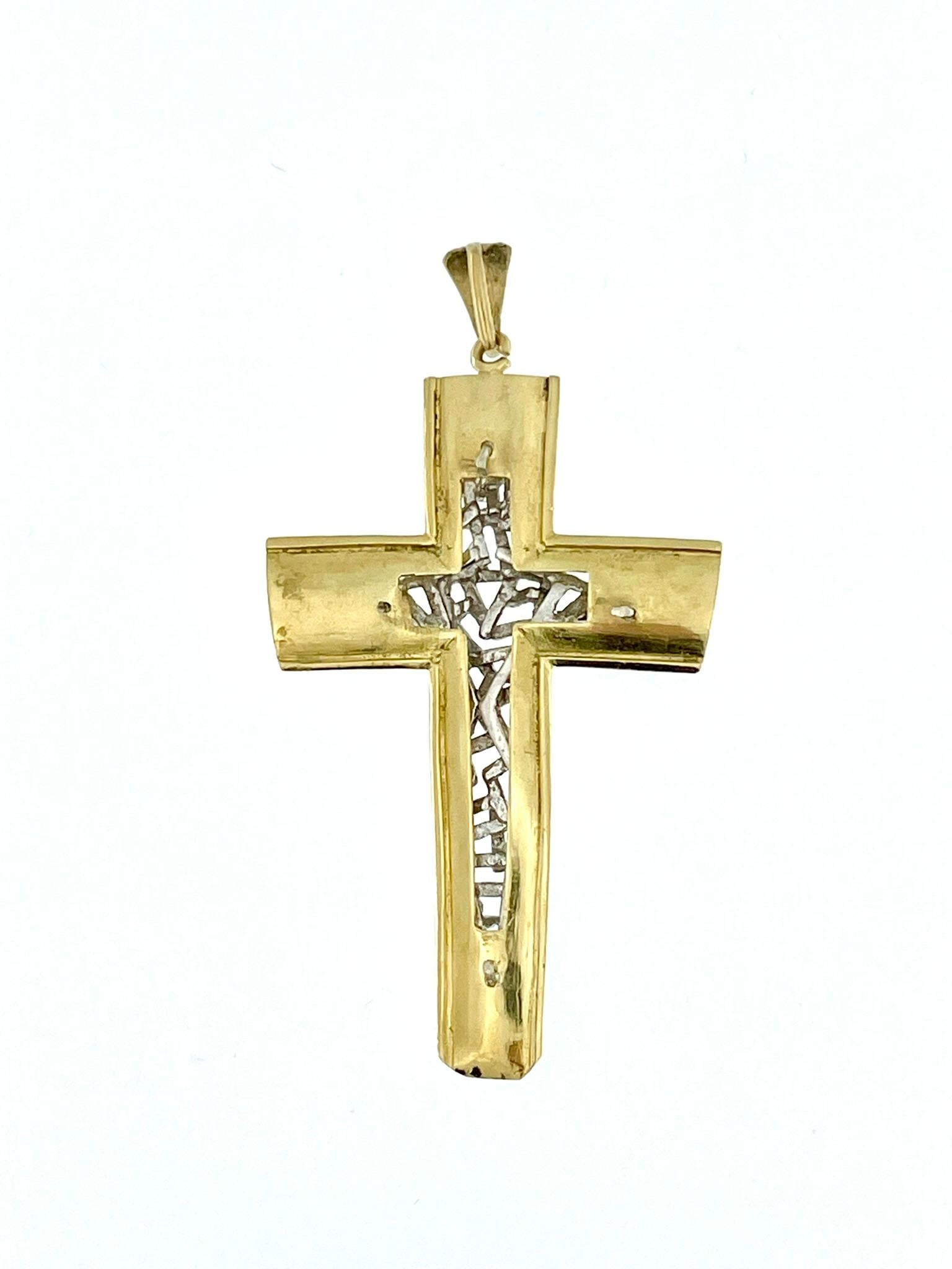 The Hand-Made 18kt Gold Italian Crucifix is a meticulously crafted religious pendant that exudes elegance and craftsmanship. The crucifix is made from 18-karat gold, providing a luxurious and enduring quality. The use of both yellow and white gold