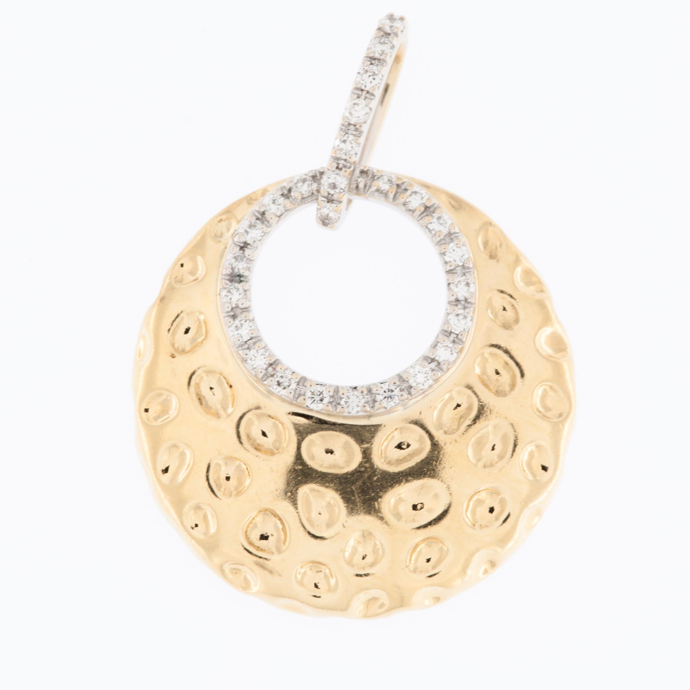 This exquisite Hand-Made Pendant is made from 18kt yellow and white Gold and it's adorned with dazzling diamonds. The lustrous 18-karat gold, known for its timeless elegance and enduring value, serves as the canvas for this breathtaking piece of