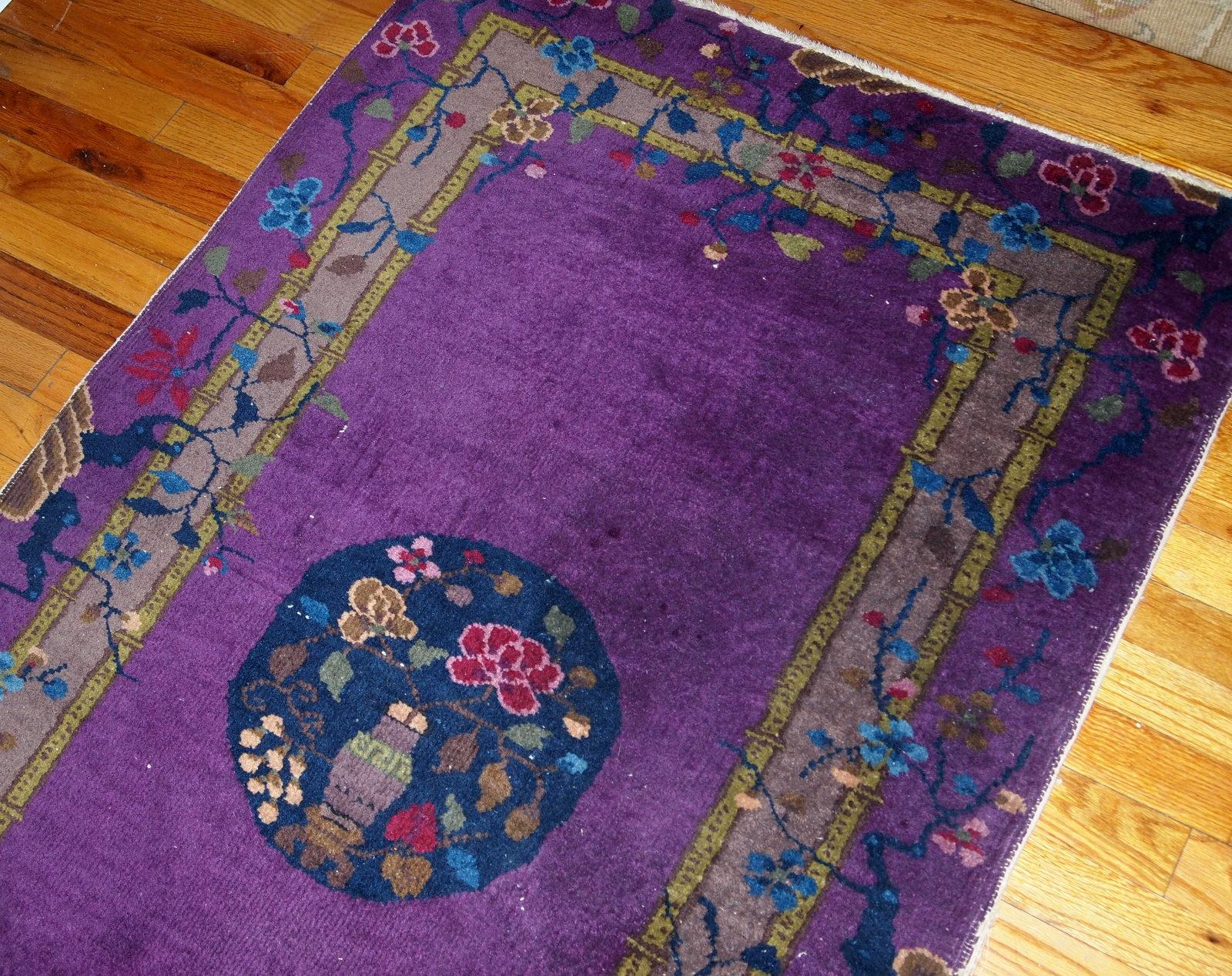 Antique handmade Art Deco Chinese rug in purple shade. It has been made in wool in the beginning of 20th century.

-condition: Original good,

-circa: 1920s,

-size: 2.10' x 4.9' (89cm x 149cm),

-material: Wool,

-country of origin: