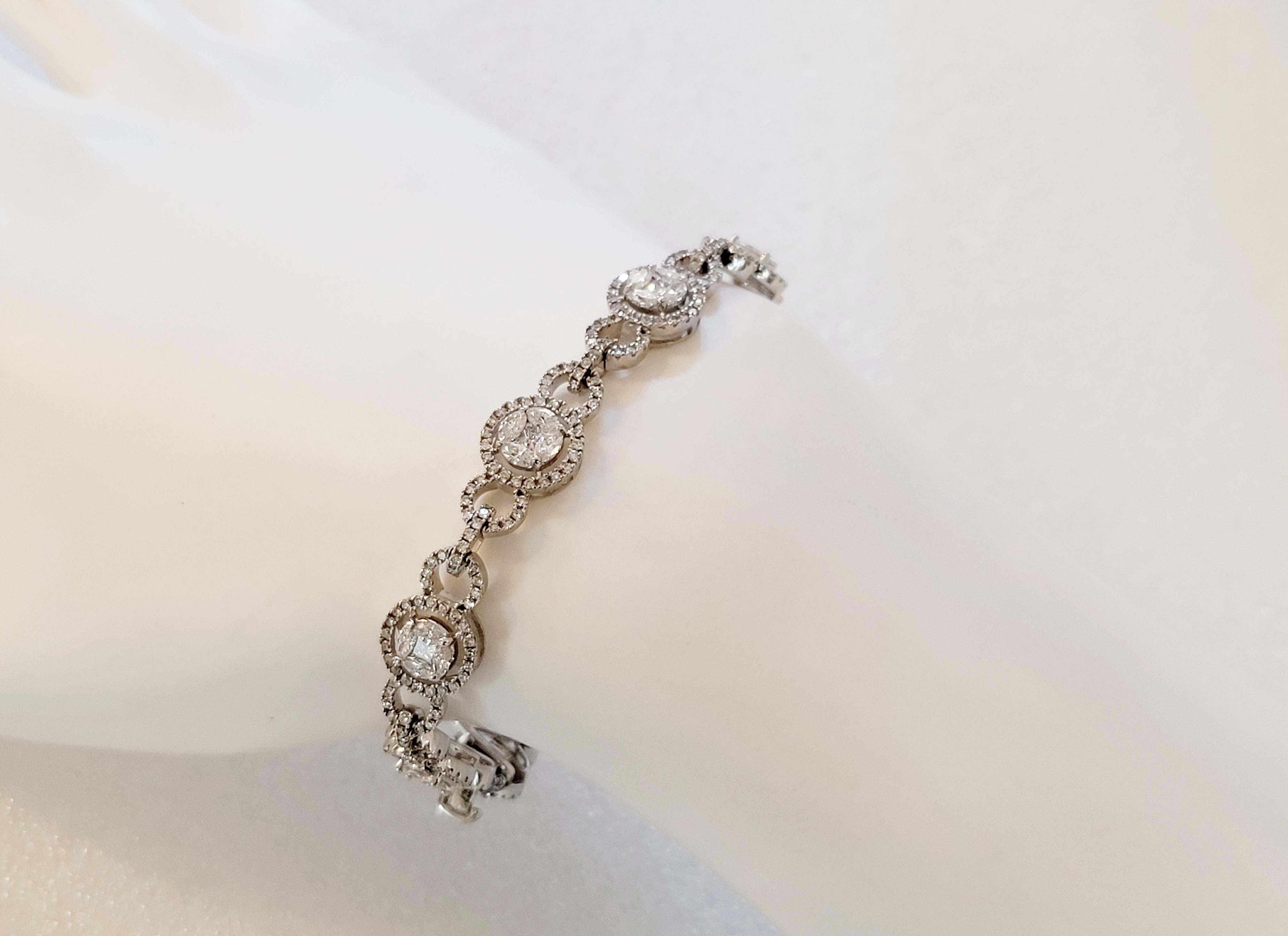 Hand Made Bracelet with Diamonds
Material 14K White Gold
Gender Women 
Diamonds 5.90ct
Diamond Clarity VS
Color Grade G
Bracelet Length 7'' Long 
Bracelet Weight 14.6gr
Condition New, with tags
Retail Price $12000