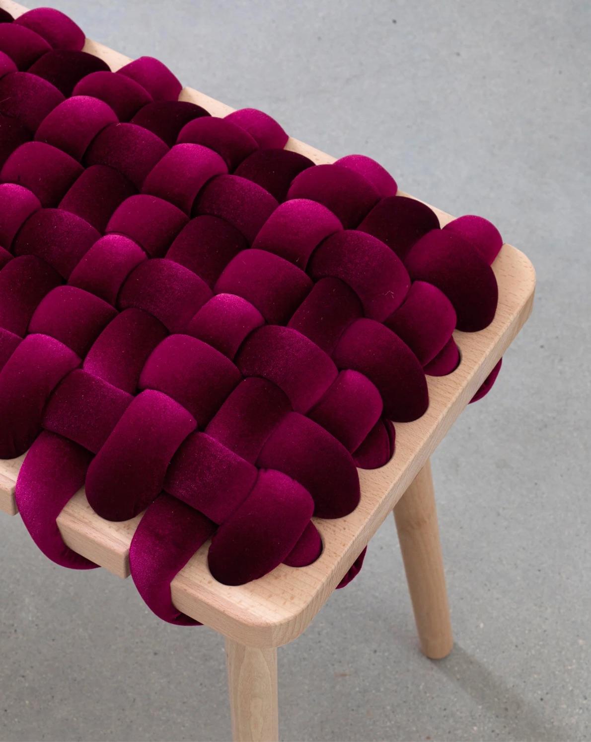 Born of appreciation for elegance, the woven bench is a handmade piece that brings a sculptural, playful air to any entryway or living space. Each bench is crafted with care using a weaving technique that blends fine velvet fabric and natural