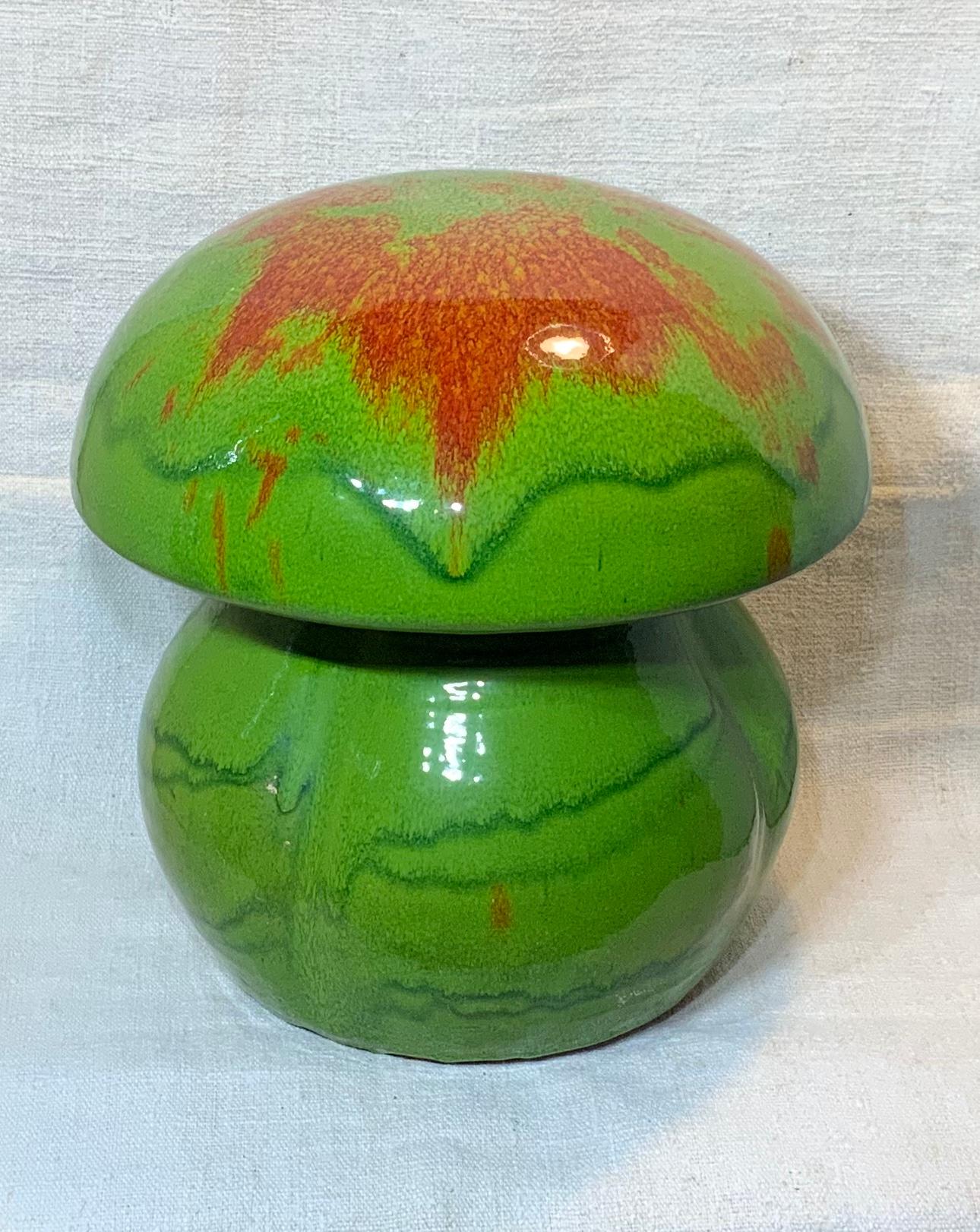 Exceptional ceramic mushroom painted and glazed in vibrant fantastic green color splatter with salmon color. This piece is very decorative and attract attention because it’s color and could be used as centerpiece too.