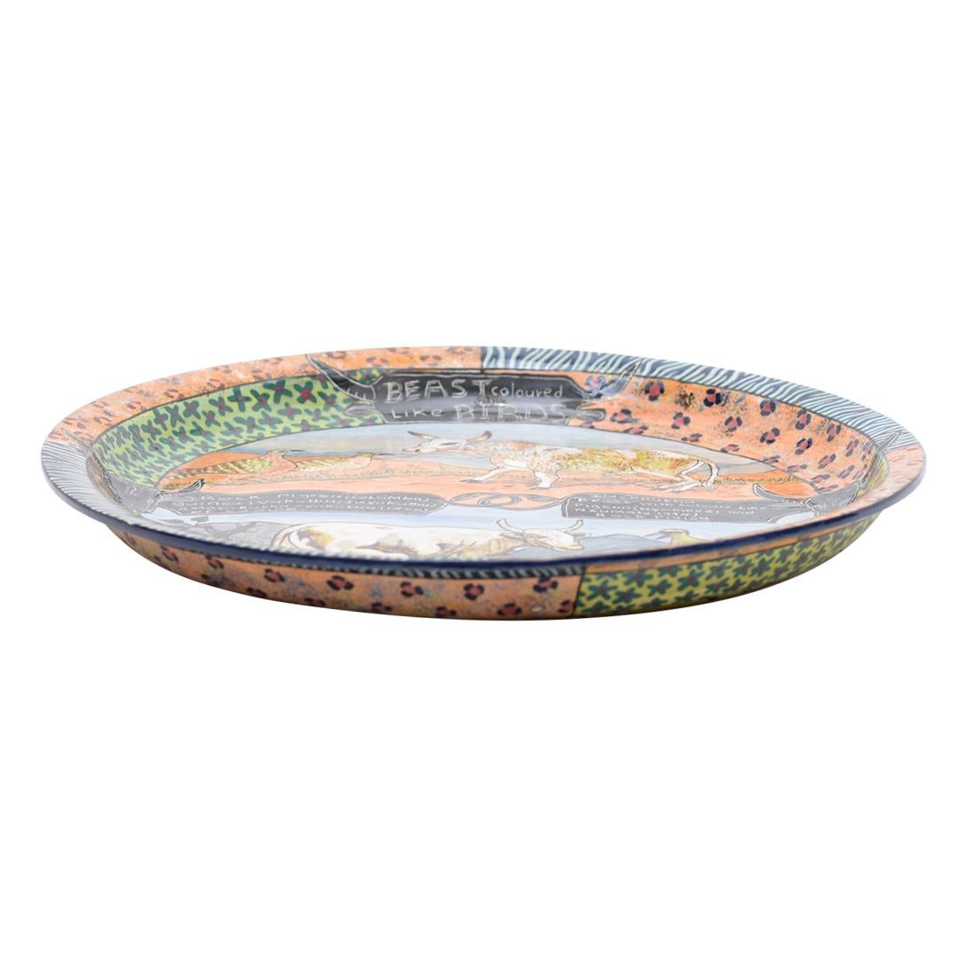 Cow plate with 2 scenes by Ardmore Ceramics. Hand sculpted by Magnificent and hand painted by Magnificent in South Africa. Measuring 2 inches high 16 inches in length and 16 inches in width.
this item is one of the kind no duplicated cow and birds