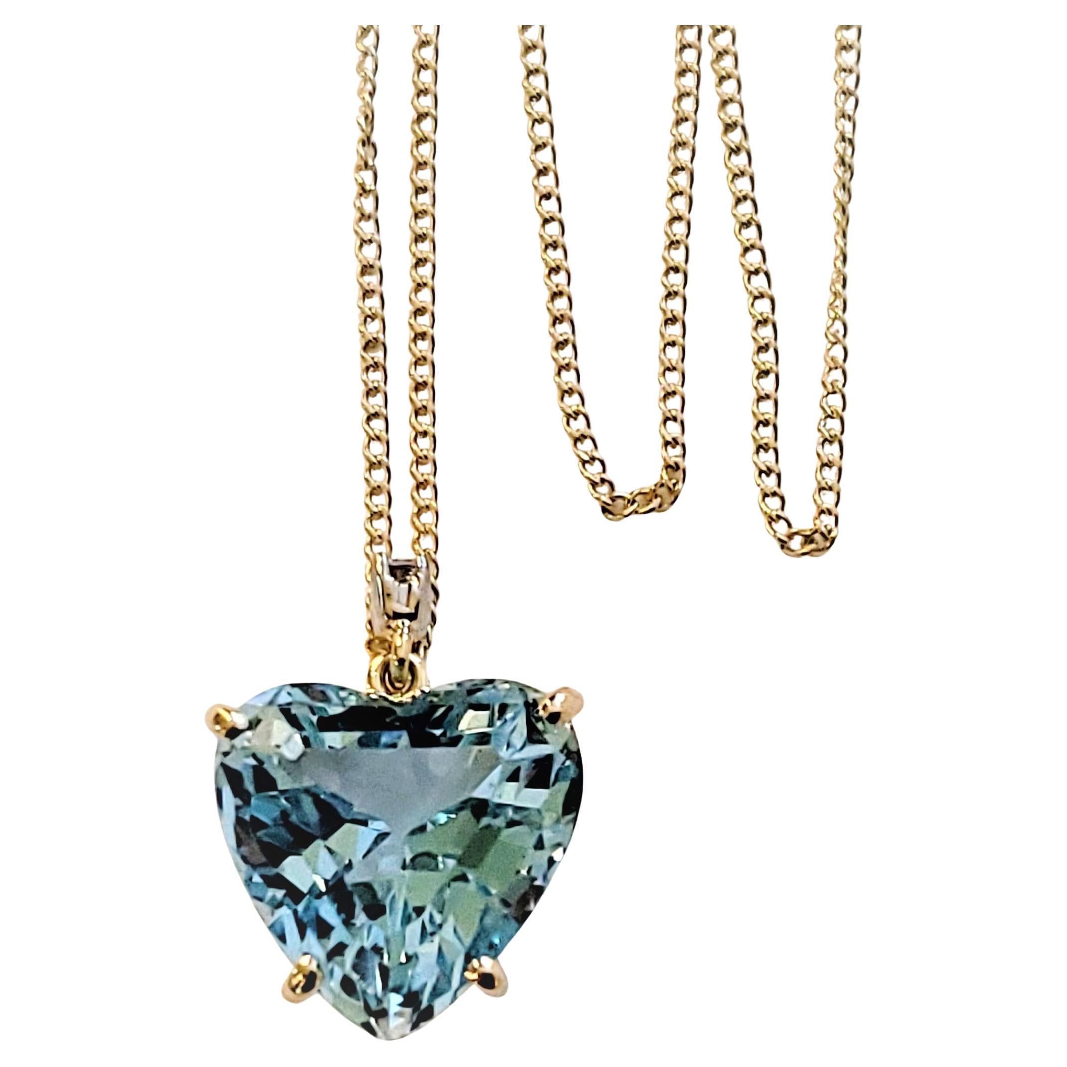 Hand-Made Chan with Topaz Pendant & Diamonds
Material  14K Yellow Gold 
Heart Cut Aqua Blue Topaz 16ct 
Diamonds .06ct
Diamond Clarity VS
Color Grade G
Chain pendant Weight 6.5gr
Chain Length 18'' 
Condition Mint, like new
Retail Price $1,900