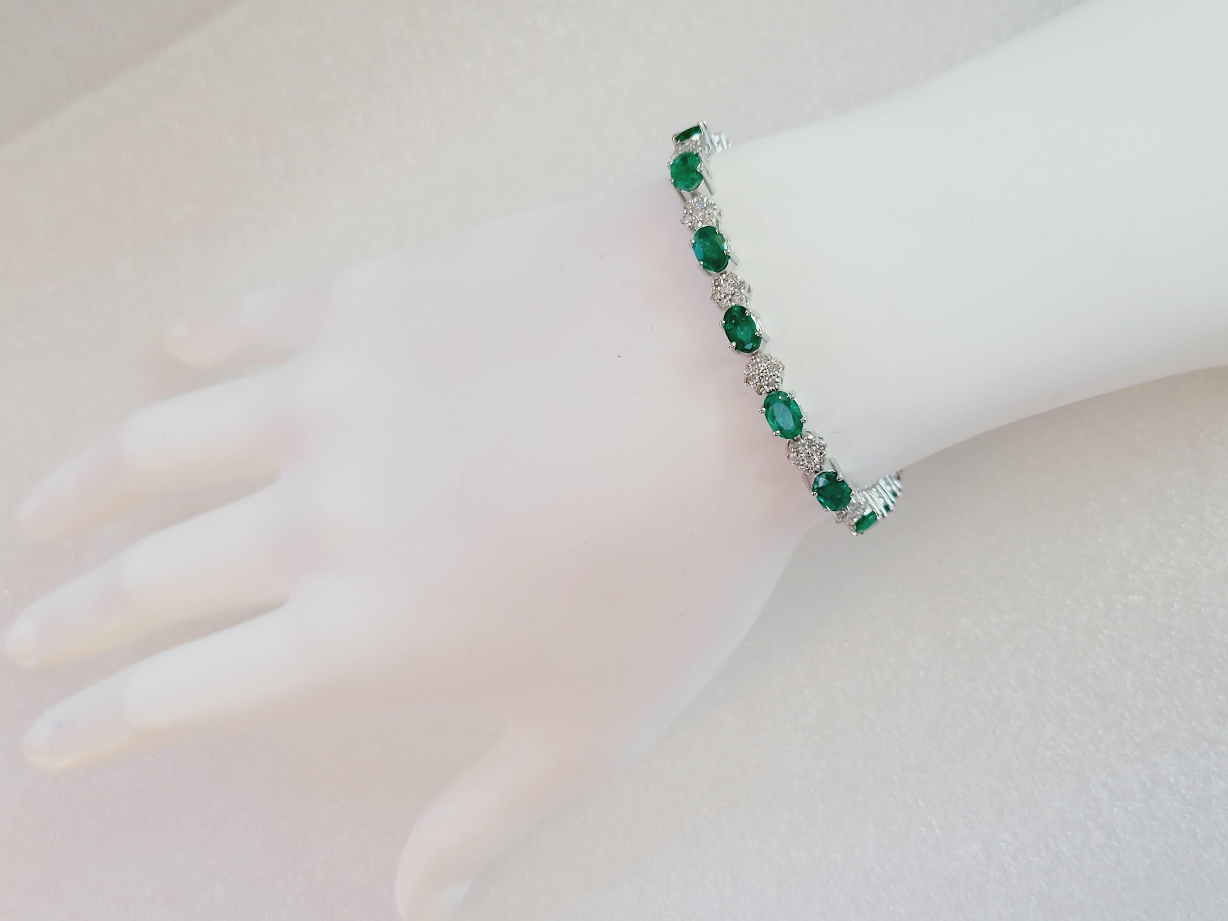 Oval Cut Hand Made Colombian Emerald Bracelet with Diamonds in 14K White Gold For Sale