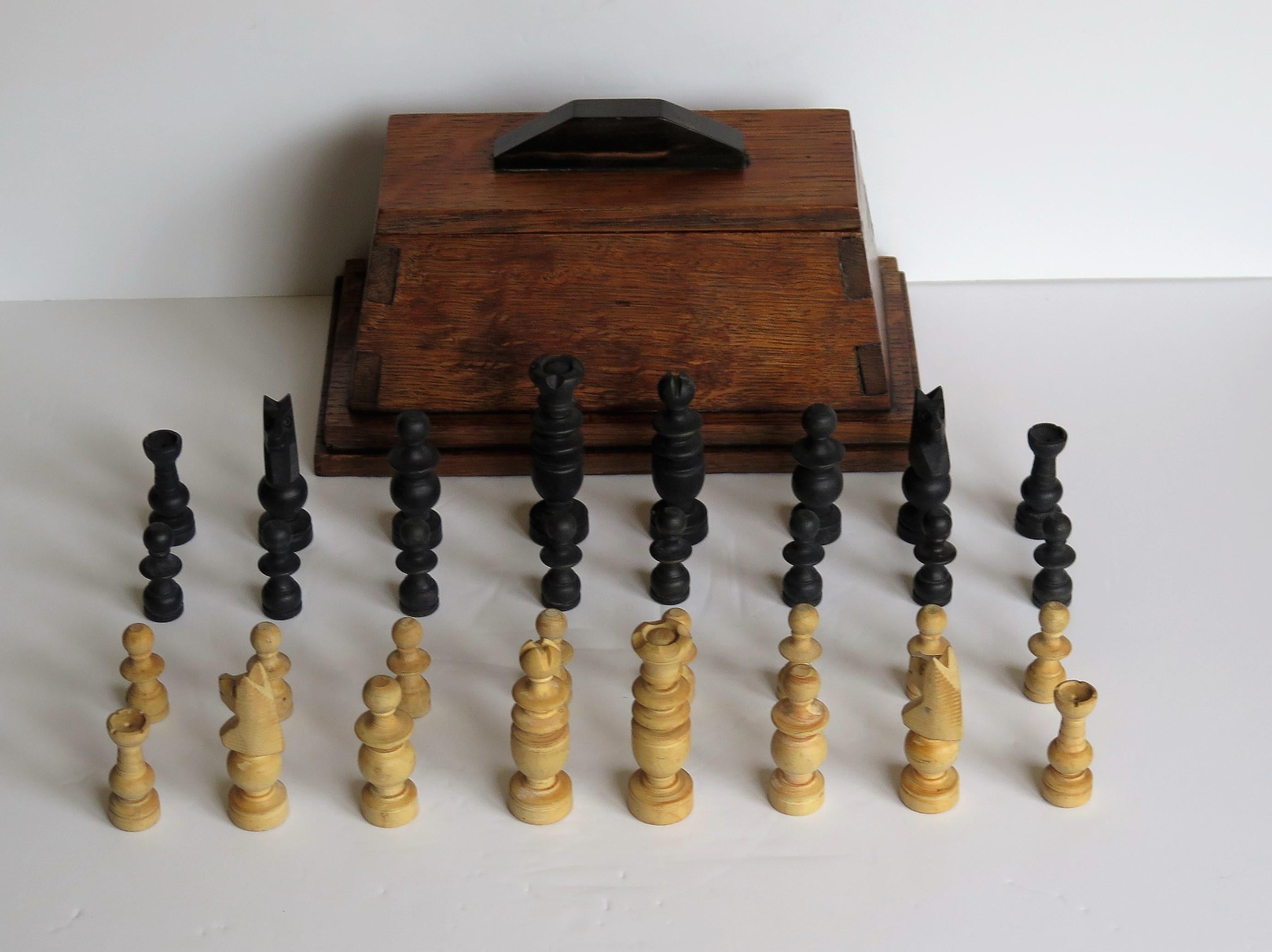 This is a good and complete handmade chess set game of 32 pieces in an Oak Lidded Box, probably made as an 