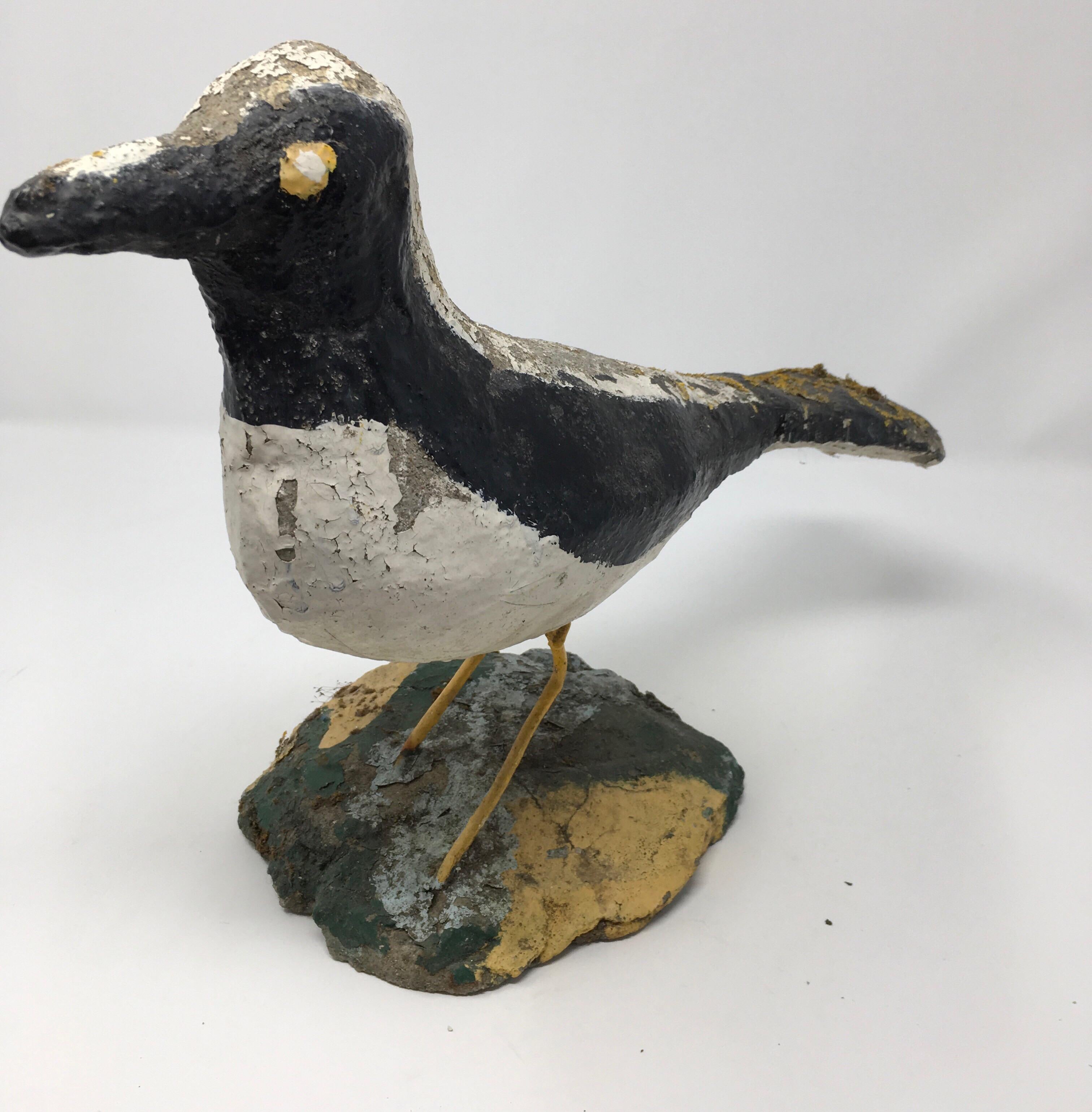Found in England, this hand made concrete bird will add whimsy and joy to any setting. When found we were told 
