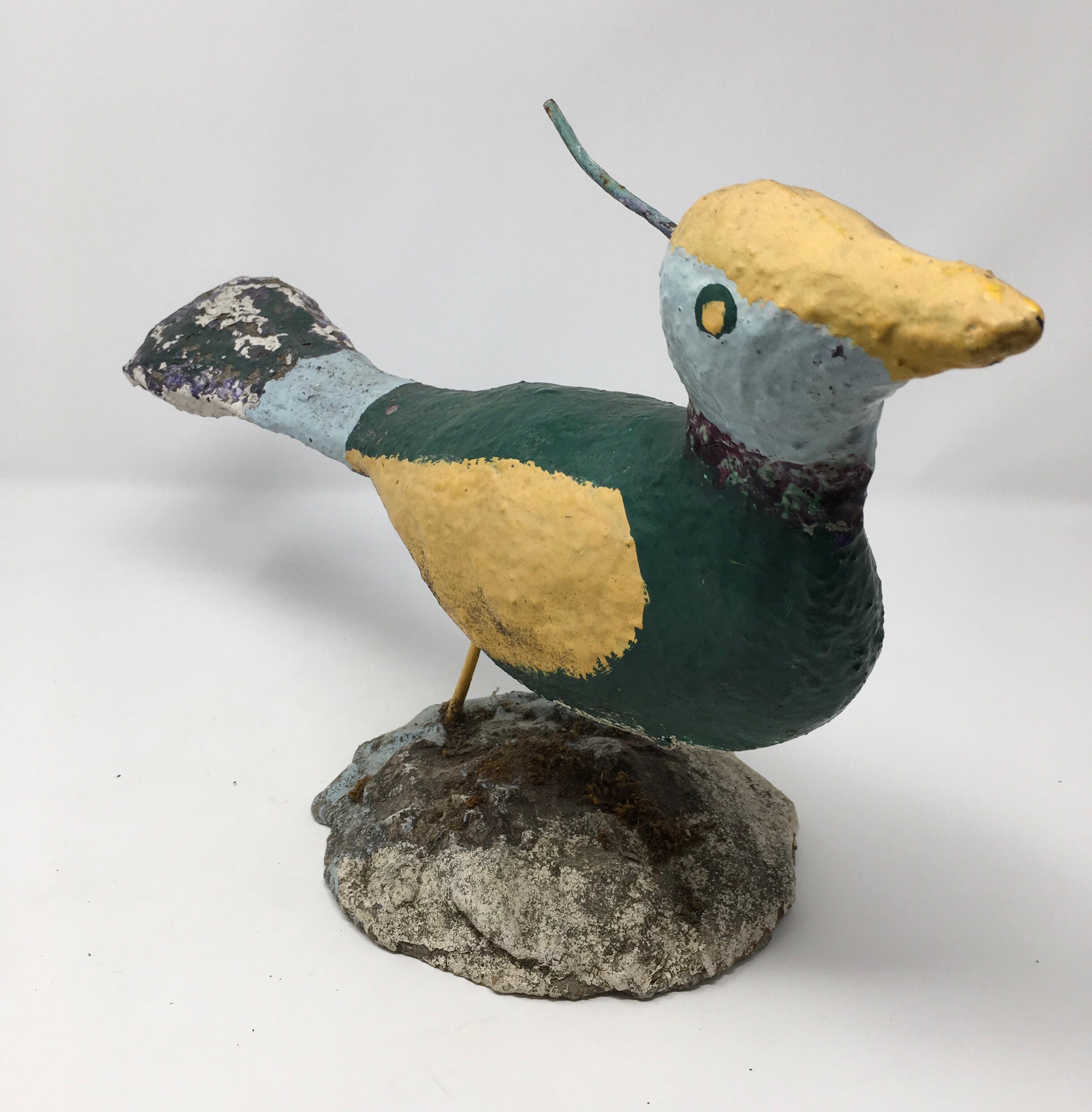 Found in England, this handmade concrete bird will add whimsy and joy to any setting. When found we were told 