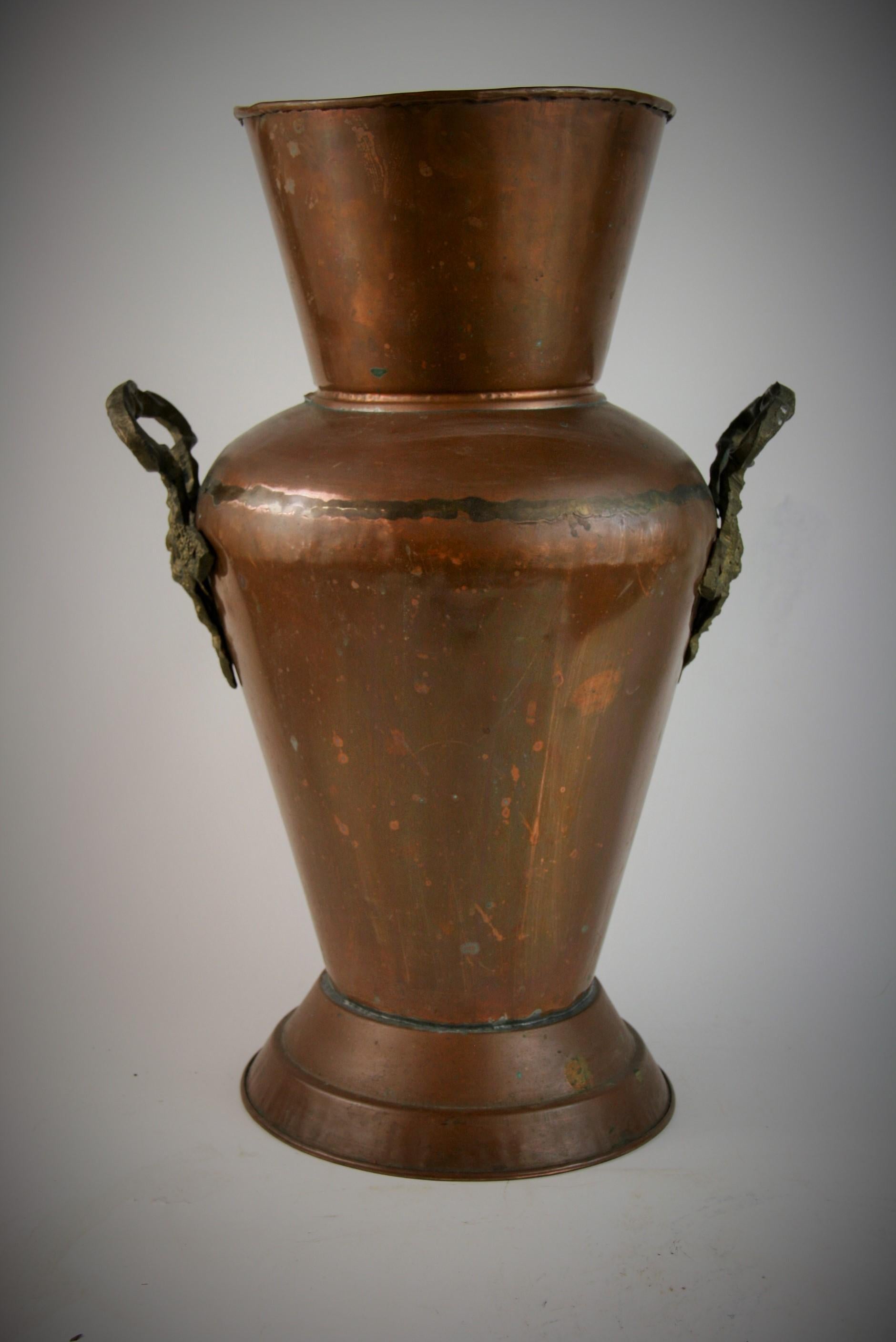 2-347 Handmade garden copper vase with cast brass handles.
Can be used as umbrella/stick stand