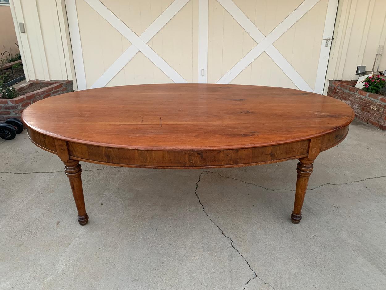 Beautiful oval dining table handmade in Italy.
The table is oval in shape measuring 117 inches (9.75 feet) wide, weights about 150-200 pounds.
Solid wood, all hand cut, crafted in Italy and labeled Provincia Di Camposasso Cat 1- Num