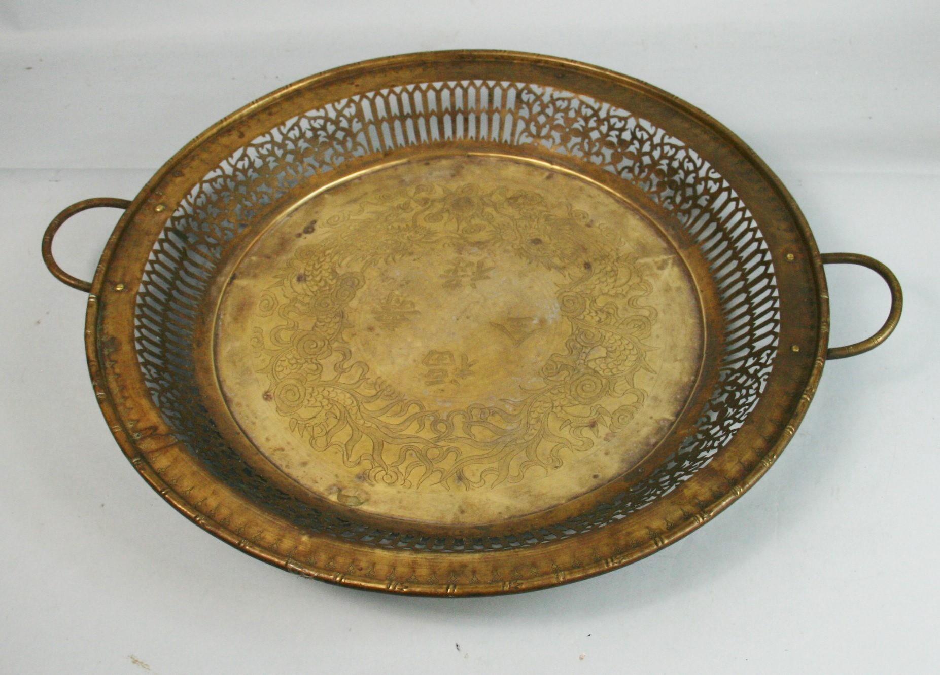 3-695 hand made brass incised serving tray.