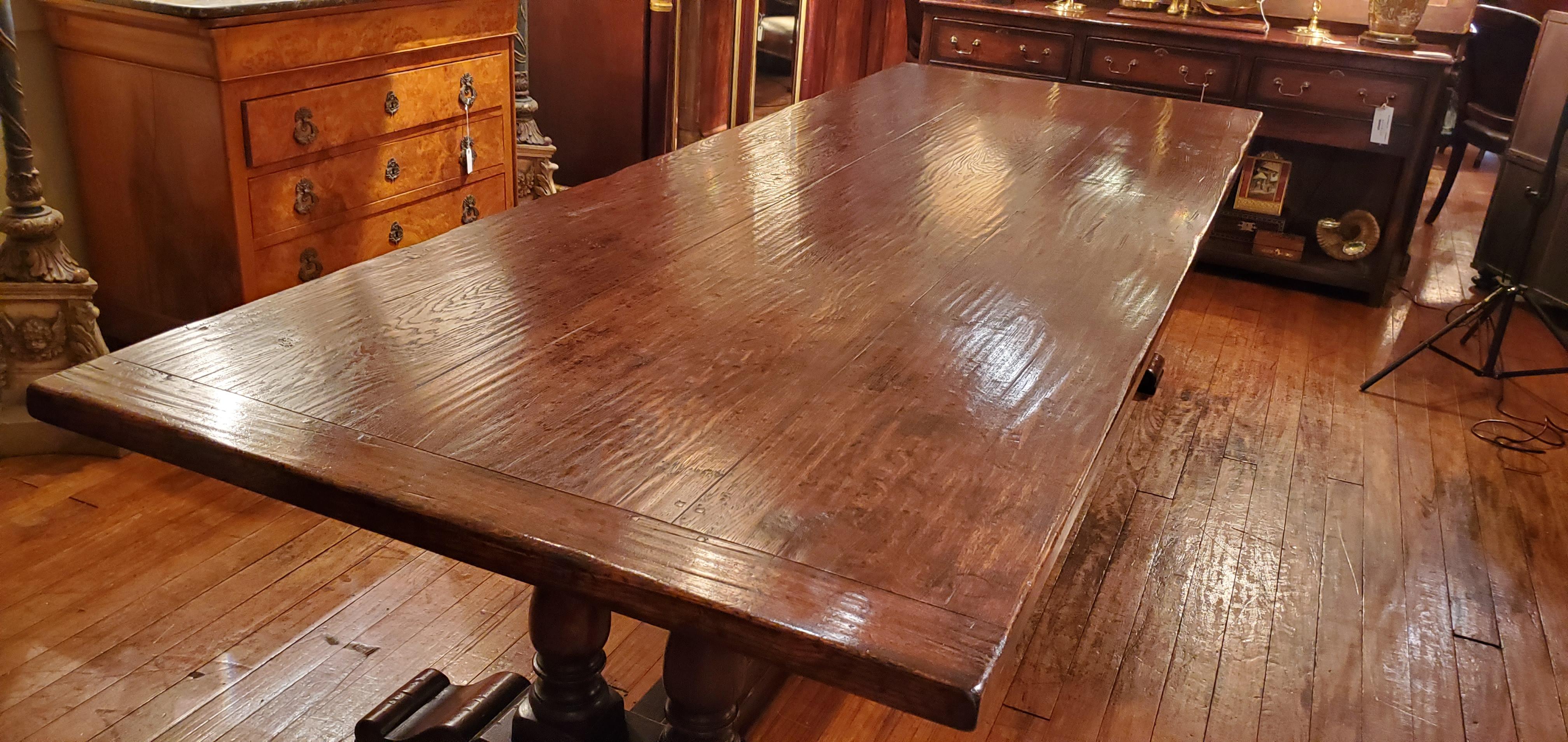 Handmade English Oak trestle dining table. Made from old oak to give it a vintage, antique appearance.