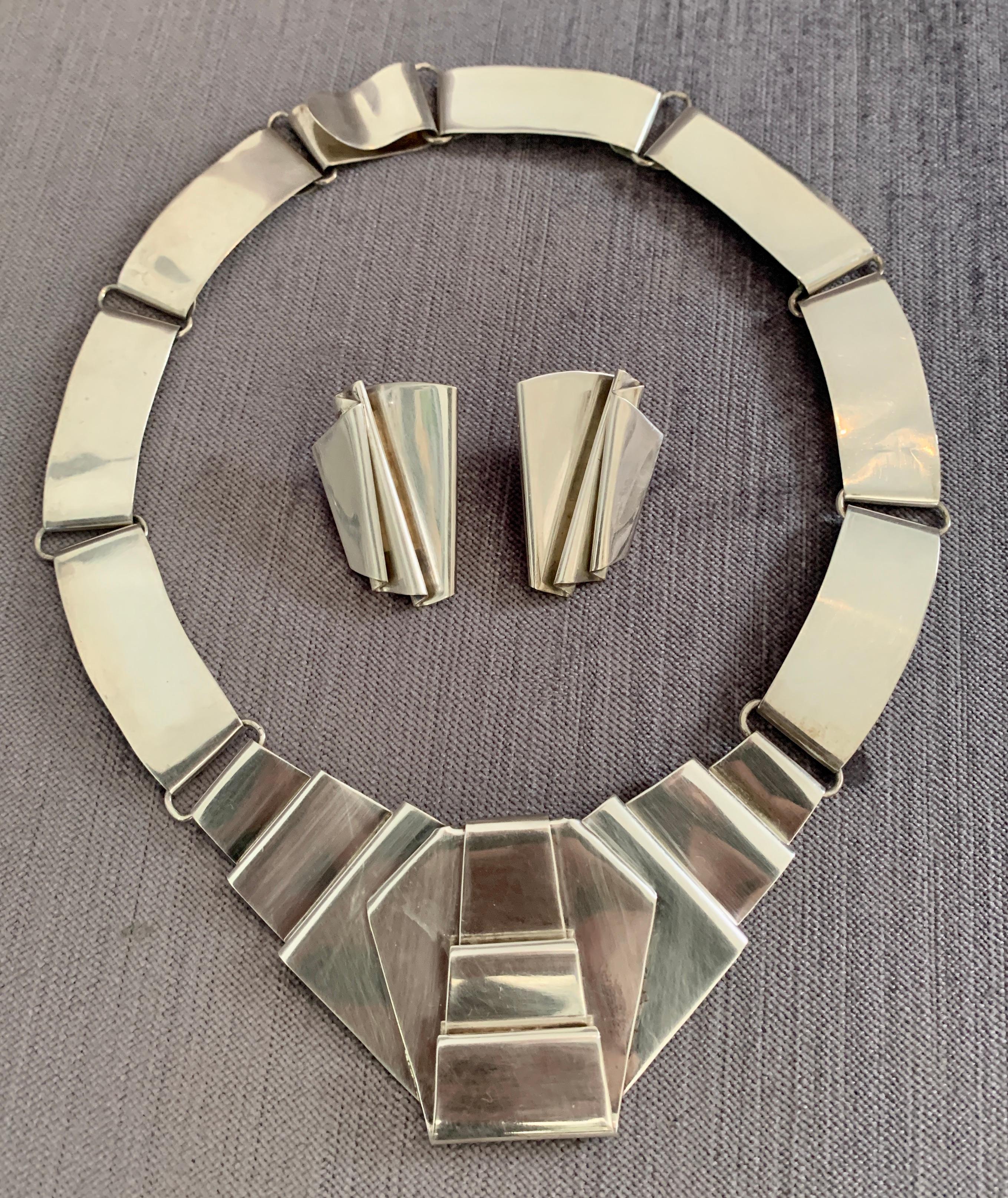 Modern and Architectural Sterling Necklace and Earrings - hand-made and trending, this piece, along with their earrings have the effortless and artistic flavor of Architect, Frank Gehry - random, yet a statement both bohemian and modern. Necklace is