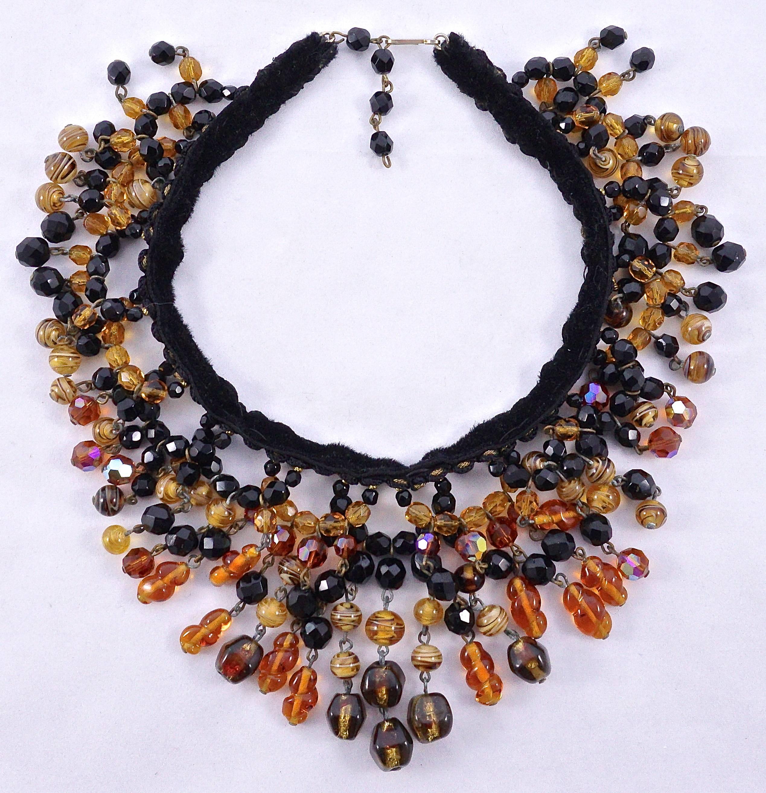 Beautiful hand made glass bead choker necklace. Measuring length 38.5cm / 15.16 inches, and the beads have a maximum drop of 7.3cm / 2.9 inches at the front. The beads are faceted french jet, foiled glass, faceted and smooth amber glass, faceted