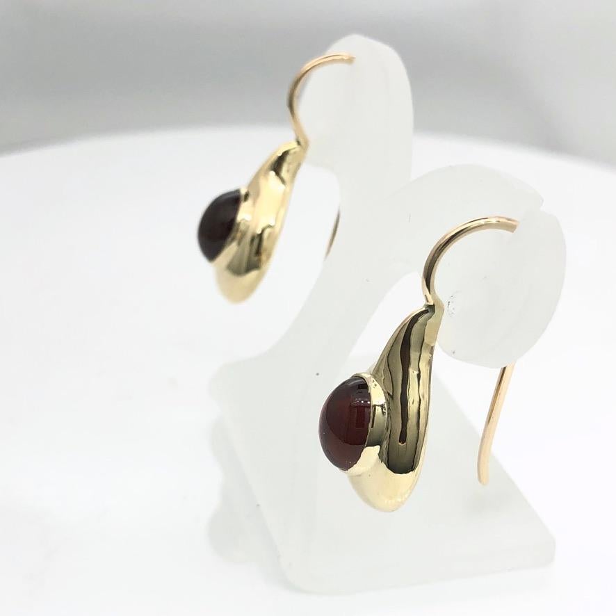 Cabochon Hand made gold earrings with cabochon garnet For Sale