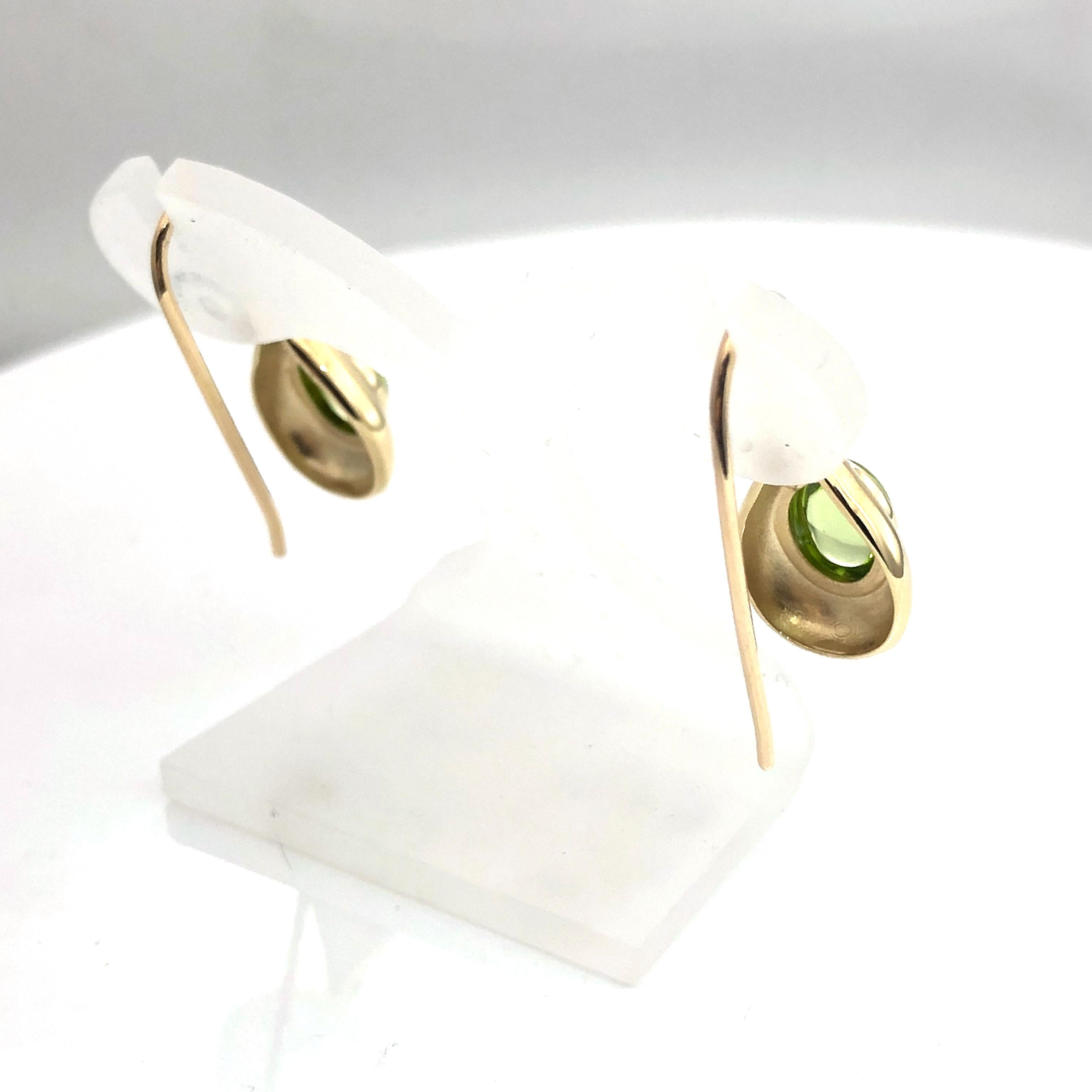Art Deco Hand made gold earrings with cabochon peridot For Sale