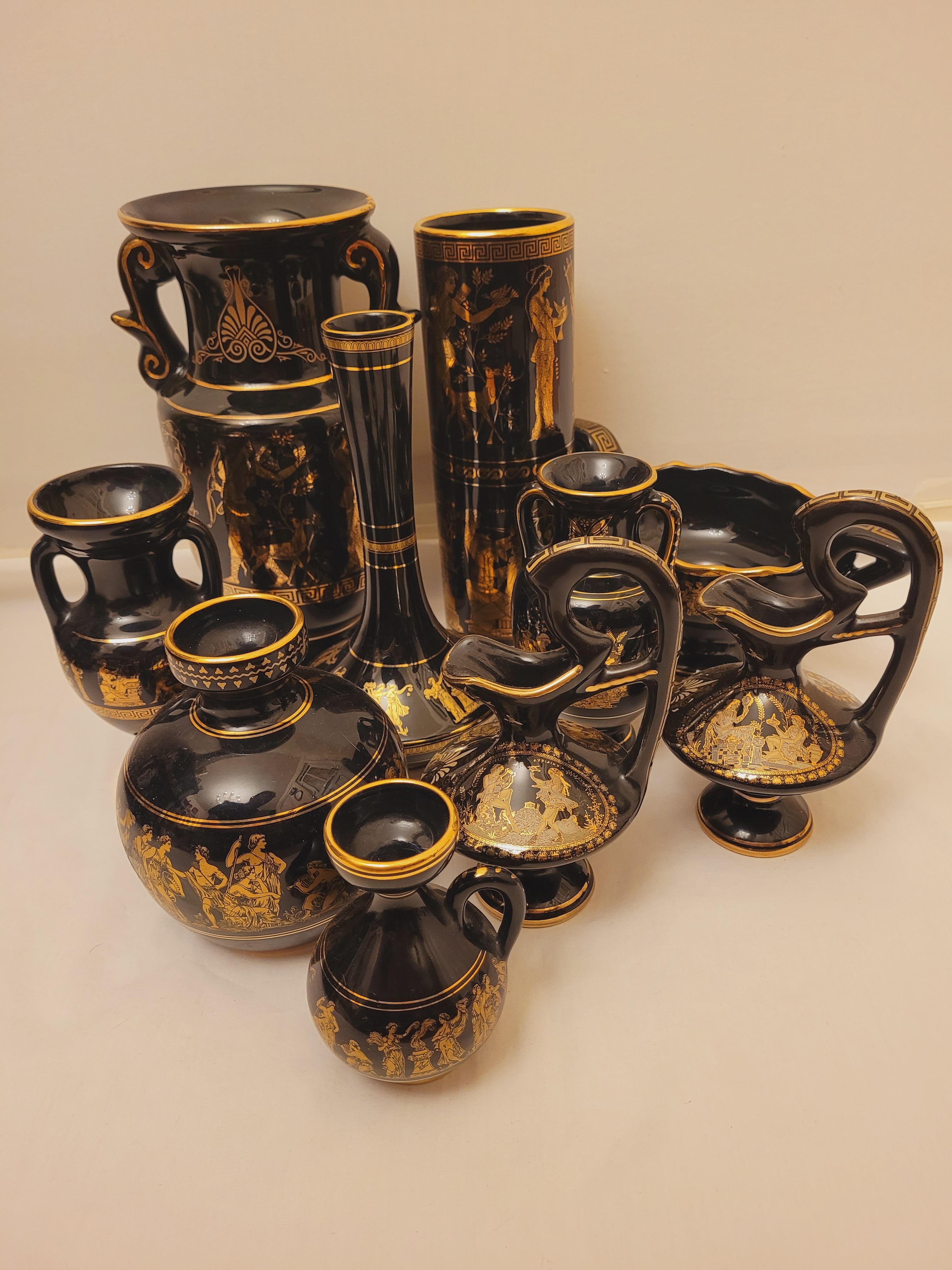Beautiful hand made ceramic art made in Greece years; 1950-1960.
Set of nine vases, one bowl and one plate. The vases are 15cm, 15cm, 22cm, 24cm, 26cm tall; the bowl is 23cm and the plate is 22cm wide. In excellent condition.