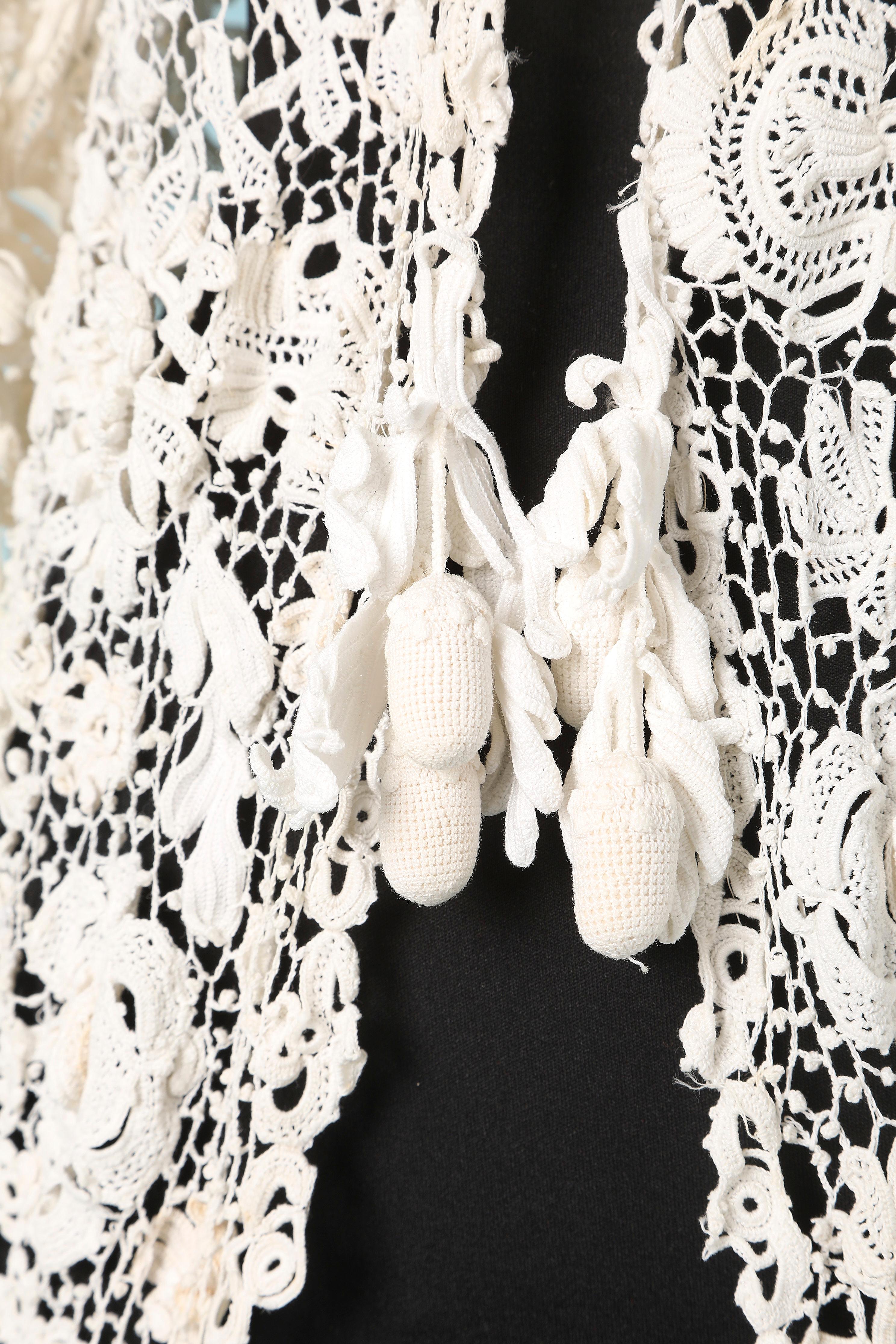 Hand made Ireland crochet coat with holding acorn fruit in crochet 