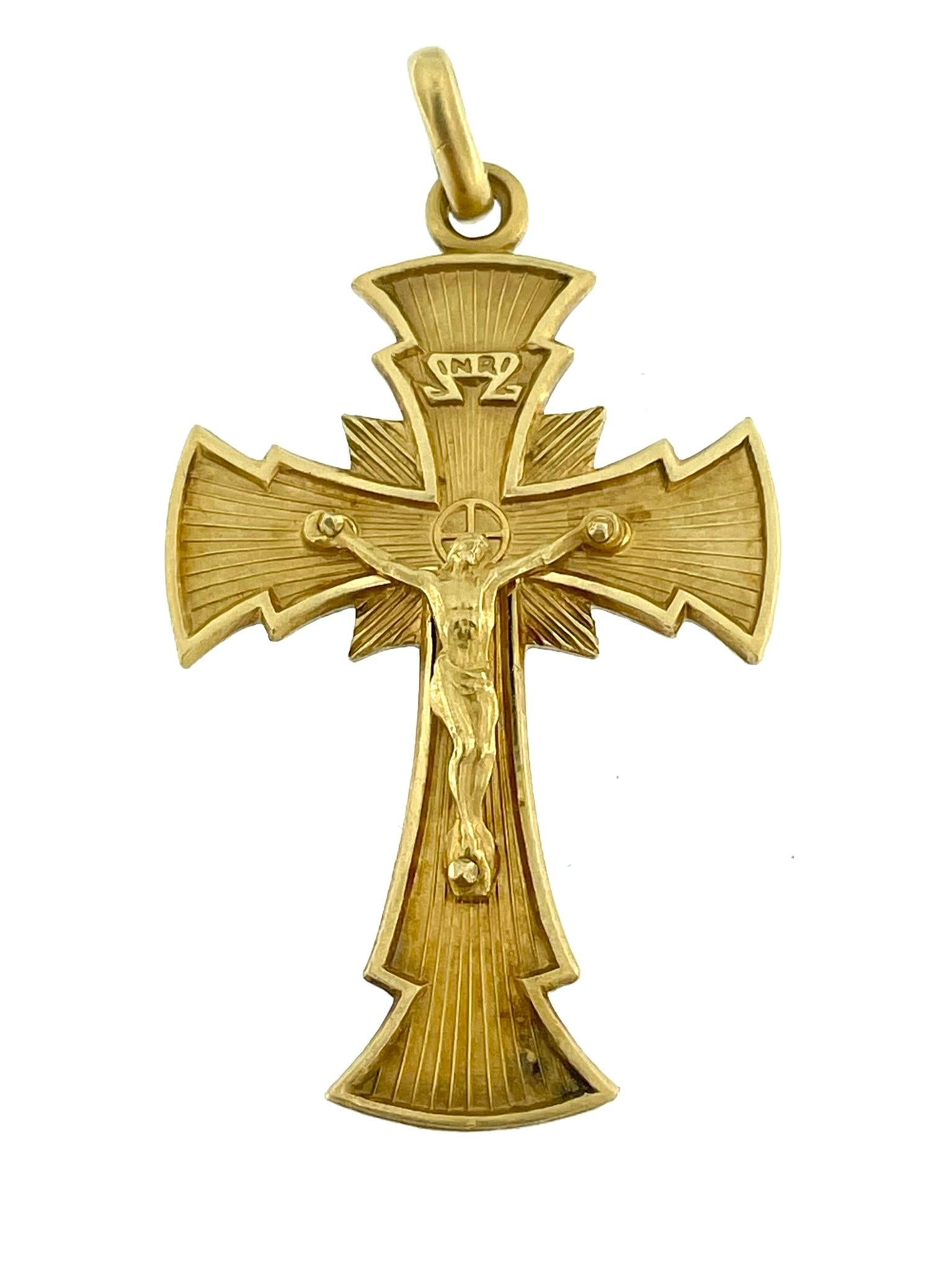 The Hand-Made Italian Crucifix in 18-karat yellow gold is a stunning testament to both craftsmanship and spirituality. The intricate design includes exquisite relief work, elevating it to a level of artistic sophistication. Each detail is carefully