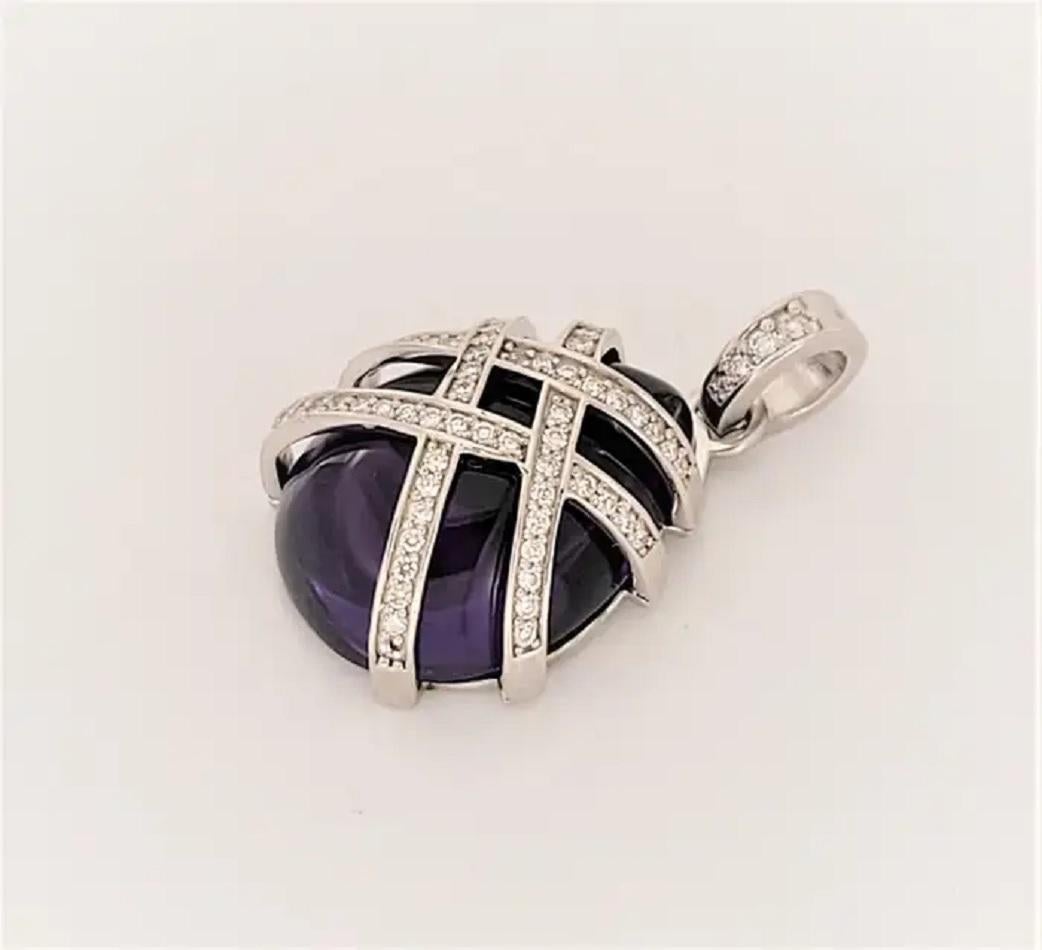 Hand Made Jeweler pendant
Natural Amethyst stone
Amethyst 8.9ct
Diamonds .80ct
Diamond clarity VS
Color Grade G
Pendant dimension 27 X 17mm
Weight 6.6gr
Retail price $2900