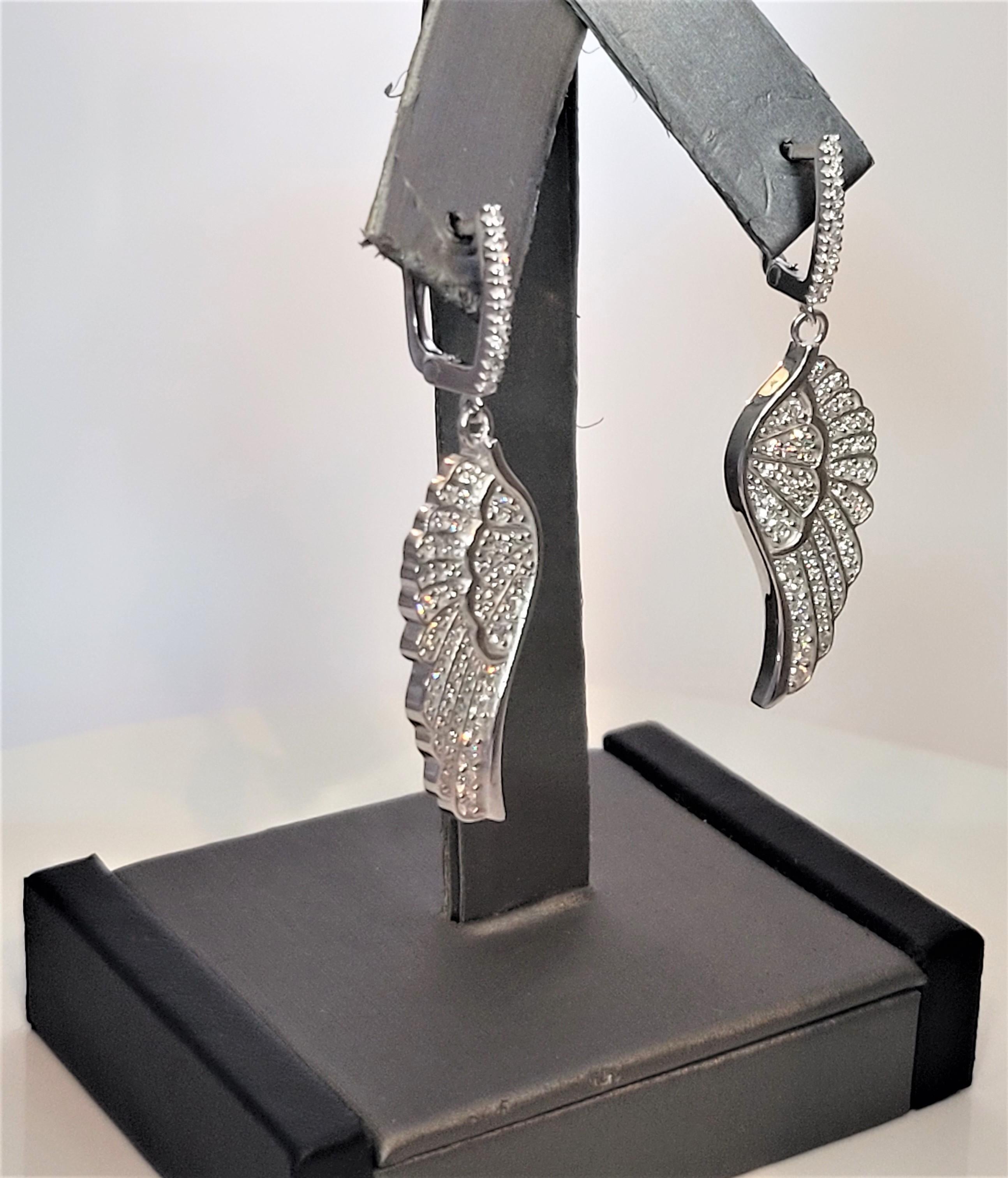 Hand Made Jeweler
Wings Earring
Diamonds 2.20ct
Diamond Clarity VS
Color Grade G
Weight 14gr total
Condition New, never worn
Retail Price $5900