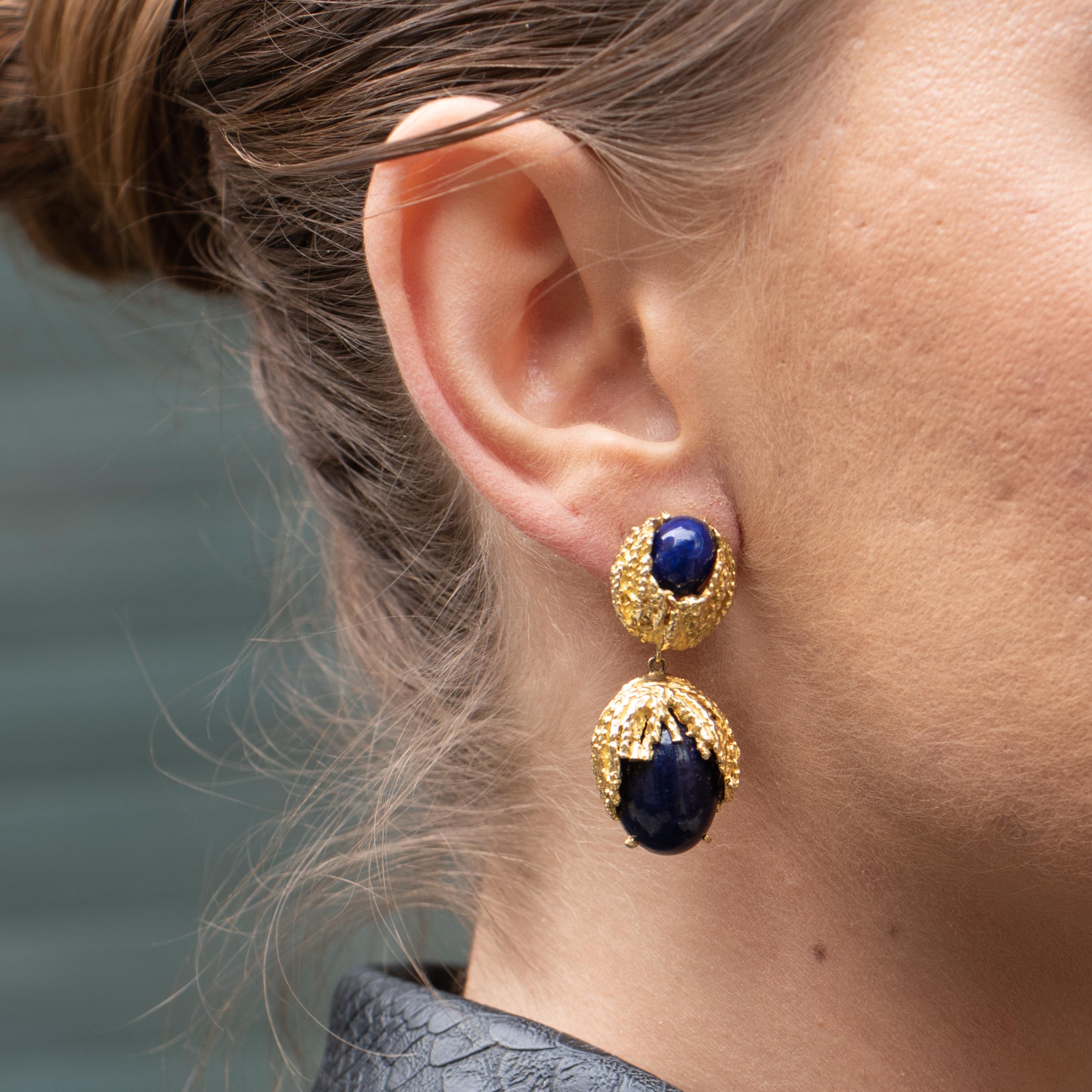 These stunning lapis lazuli earrings are vibrant with color and elegance. 
Hand Made Lapis Lazuli 
18K Yellow Gold
23.6 Grams