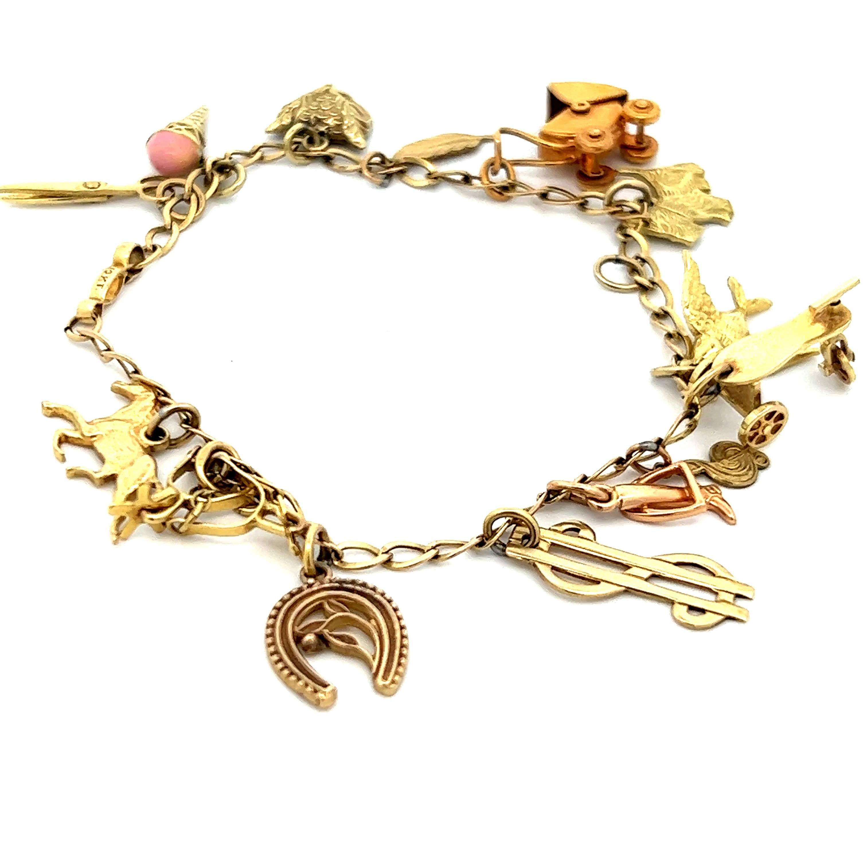 Hand Made Bracciale mobile 14 charme 10K YG Ca. 1950 in vendita 1