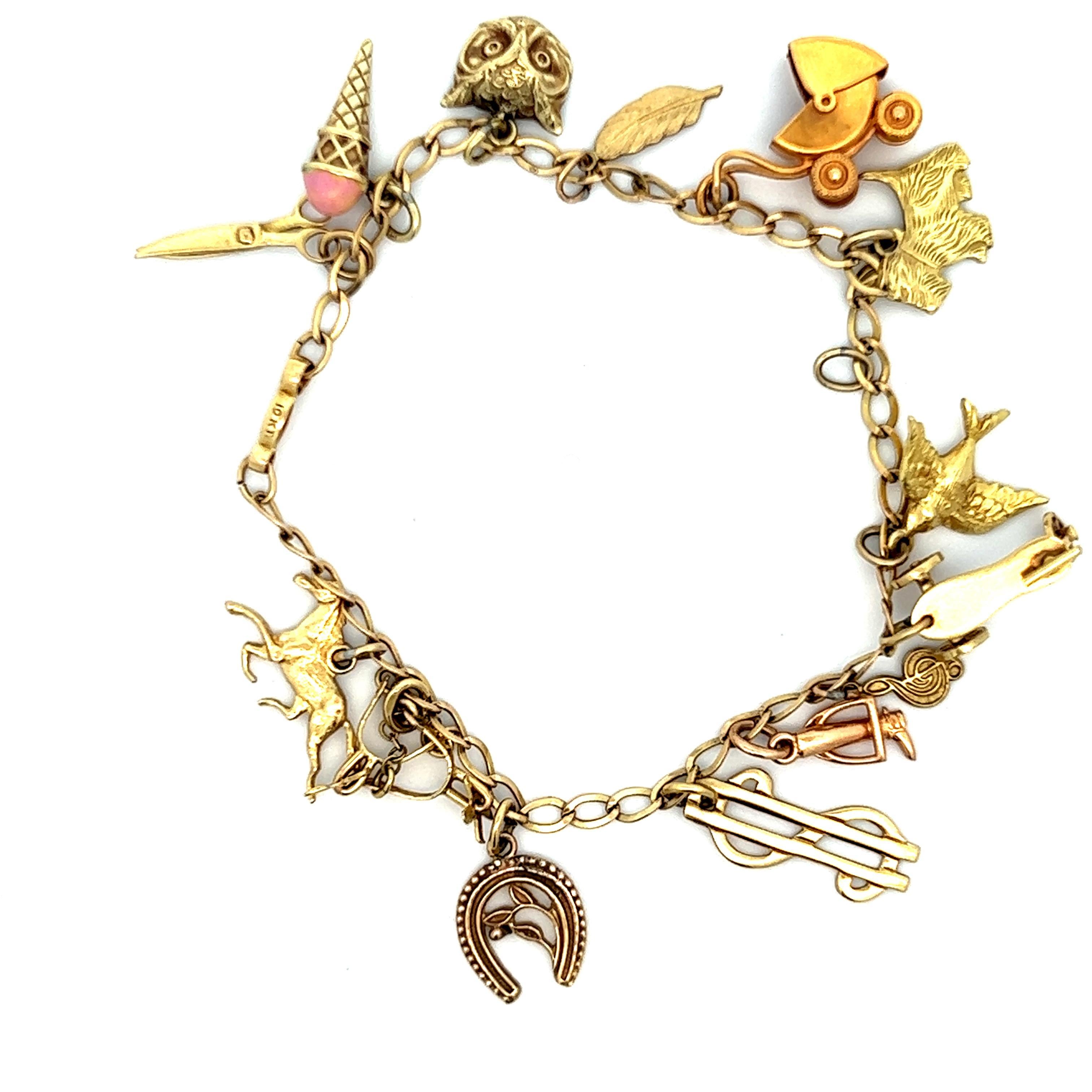 Hand Made Bracciale mobile 14 charme 10K YG Ca. 1950 in vendita 2