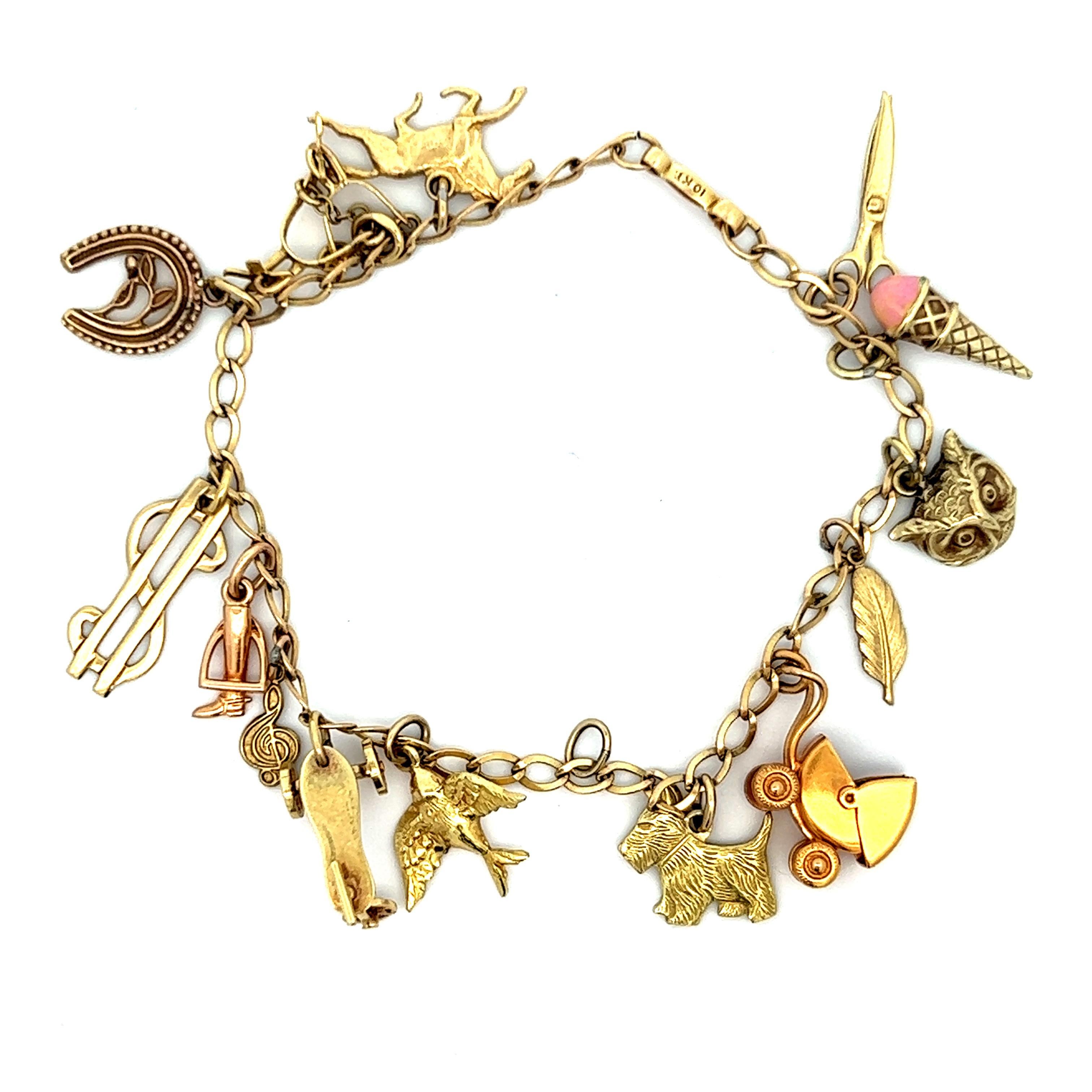 Hand Made Bracciale mobile 14 charme 10K YG Ca. 1950 in vendita 3