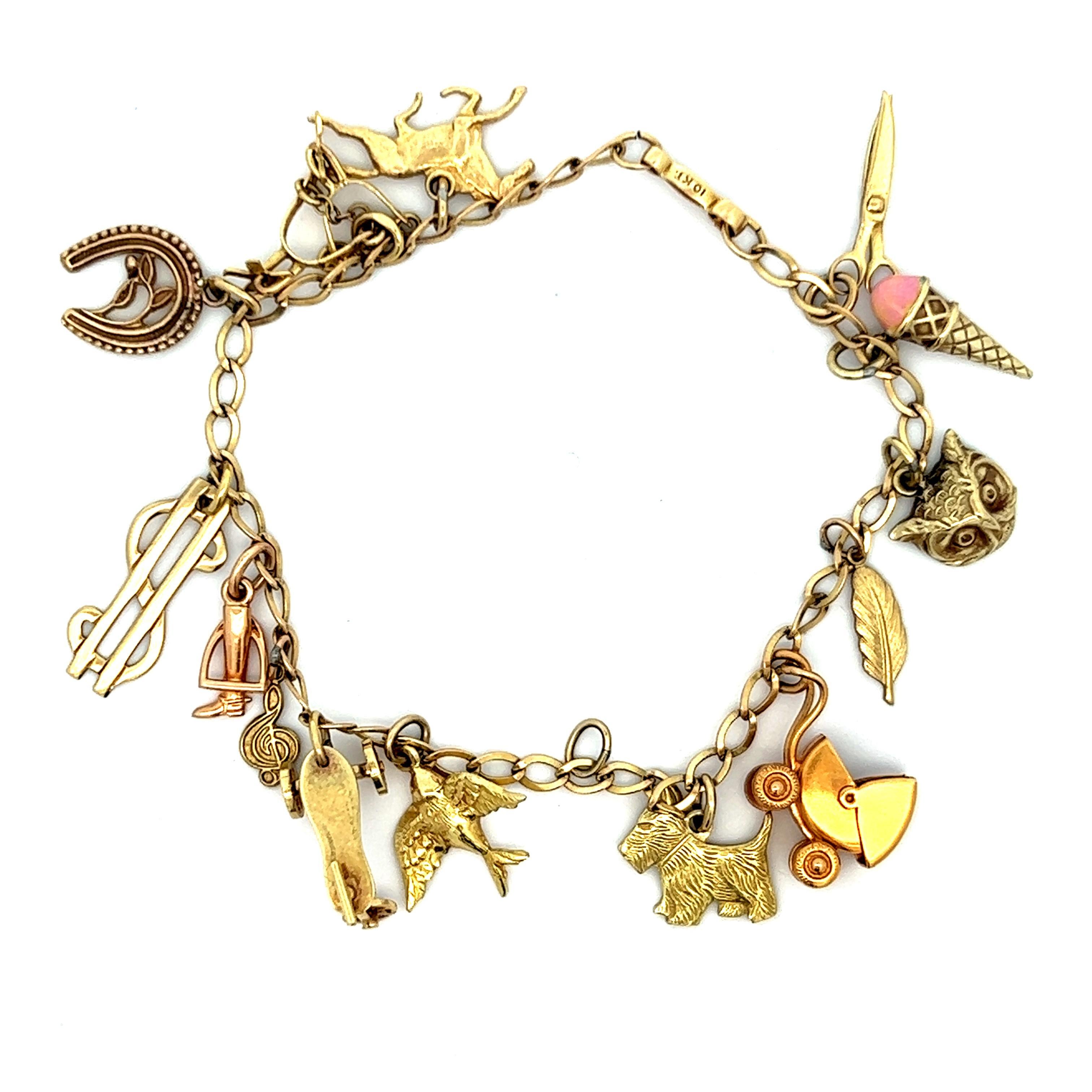 Hand Made Bracciale mobile 14 charme 10K YG Ca. 1950 in vendita 4